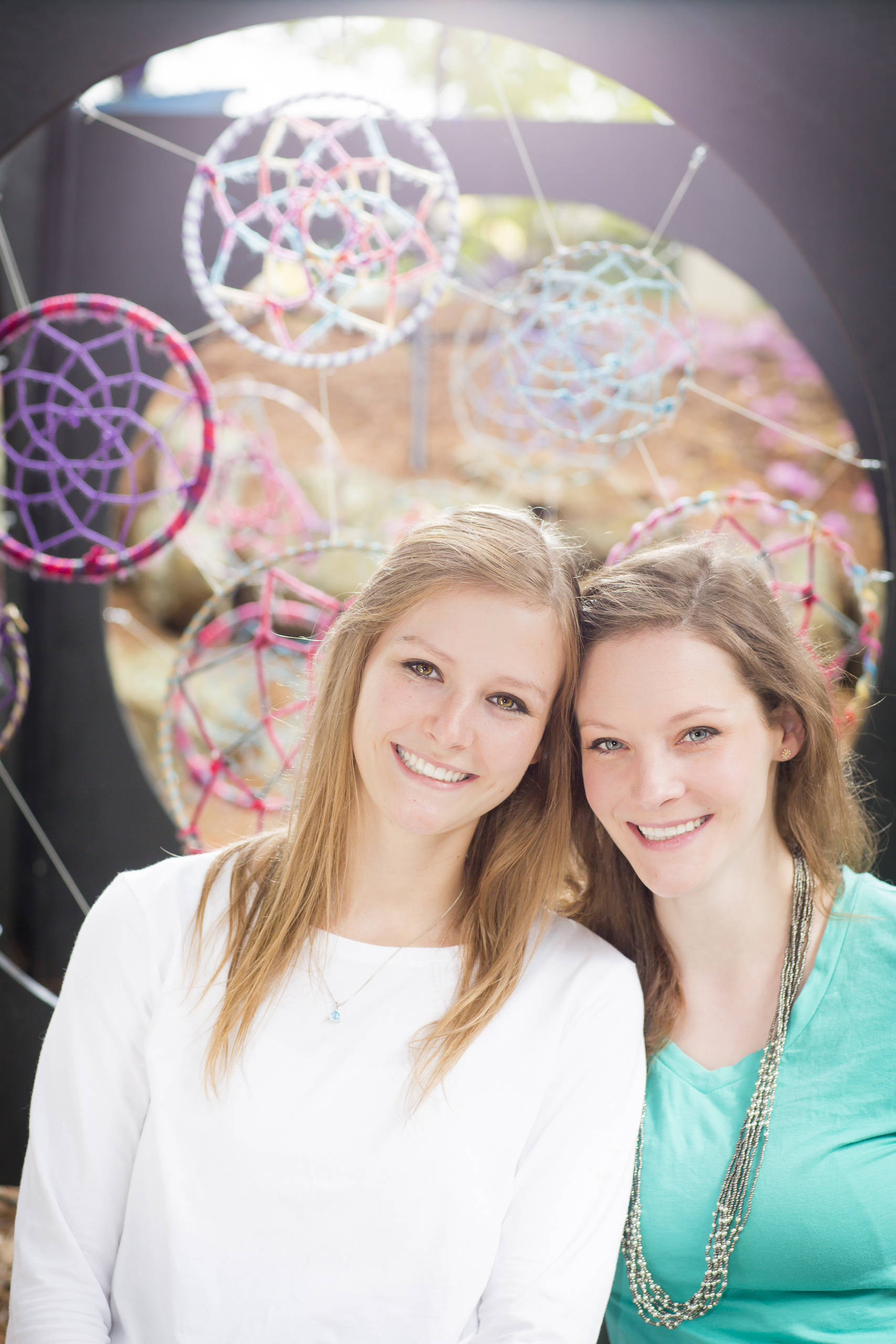 19 2 sisters family portrait outdoor session vibrant dream catchers.jpg