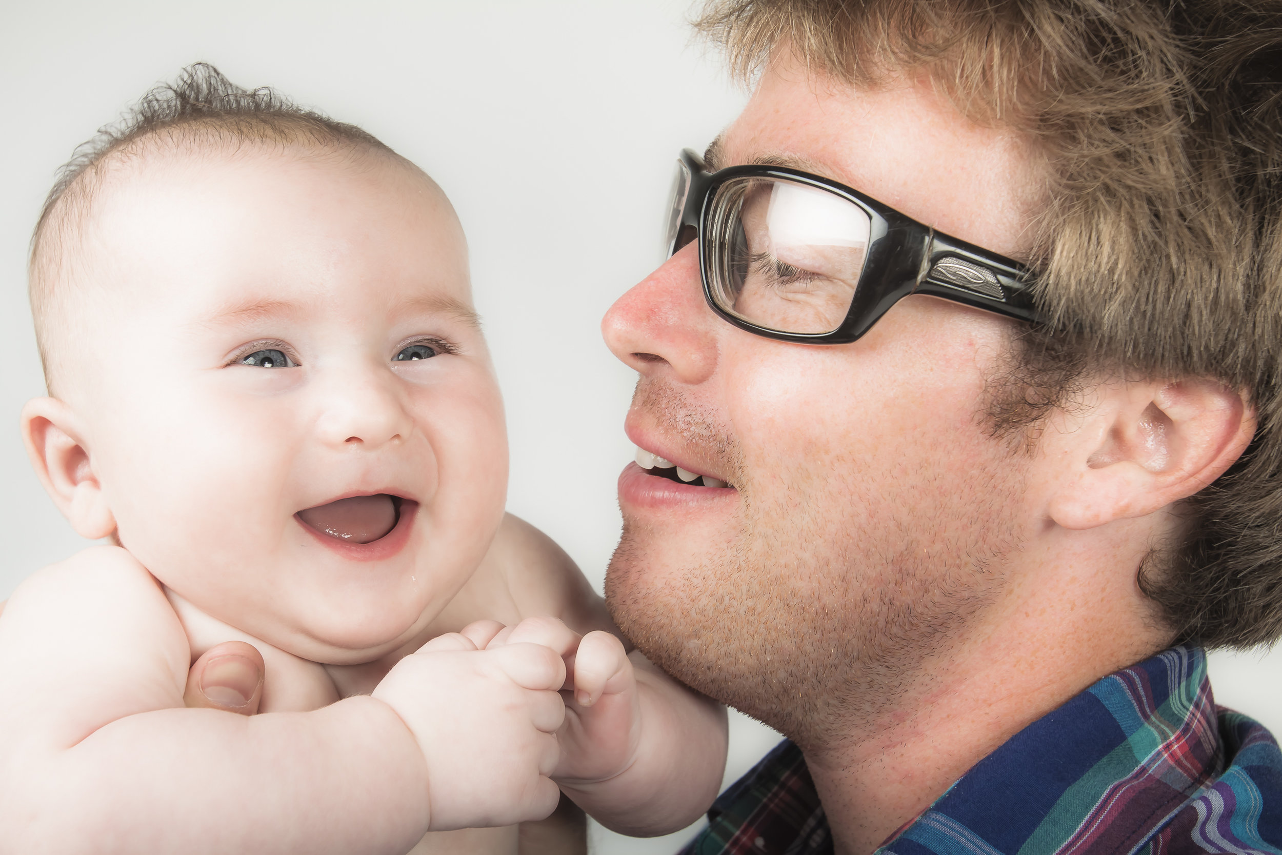 26 happy laughing modern baby with dad studio photography session.jpg