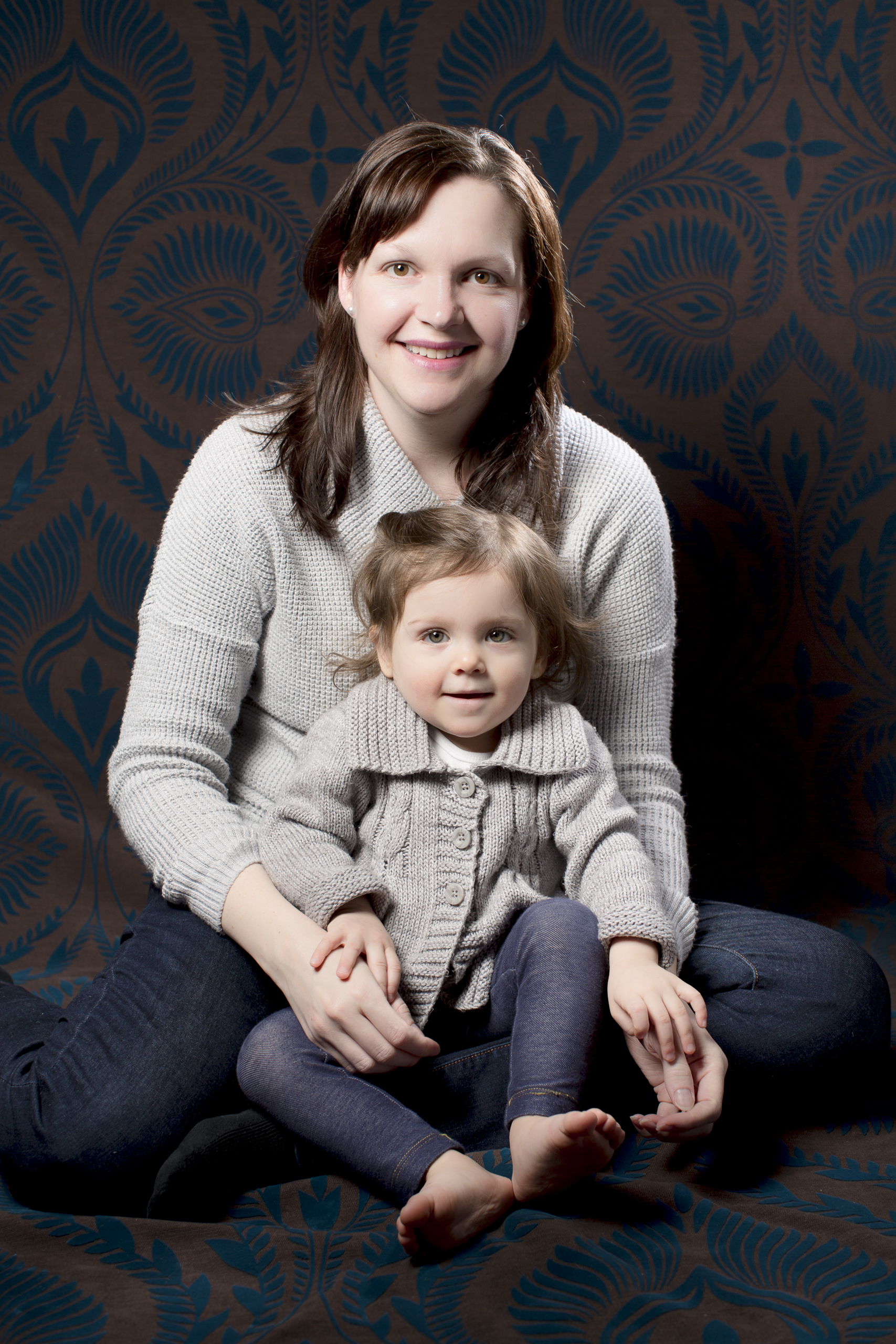 31 newborn baby momma and baby sister portrait photography session jeans and knit sweaters.jpg