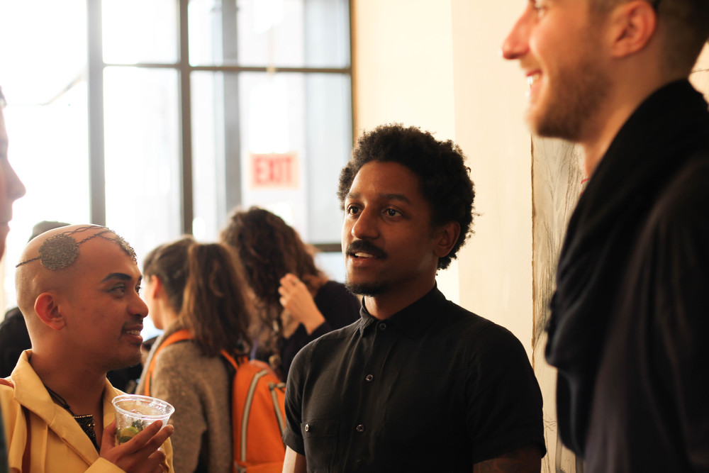 Myself, talking with Kiam Marcelo Junio, Chicago Artists Month feature artist and star of Open TV Presents: Nupita Obama Creates Vogua , and Zac Hall, who designed floral arrangements for the event at Woman Made Gallery