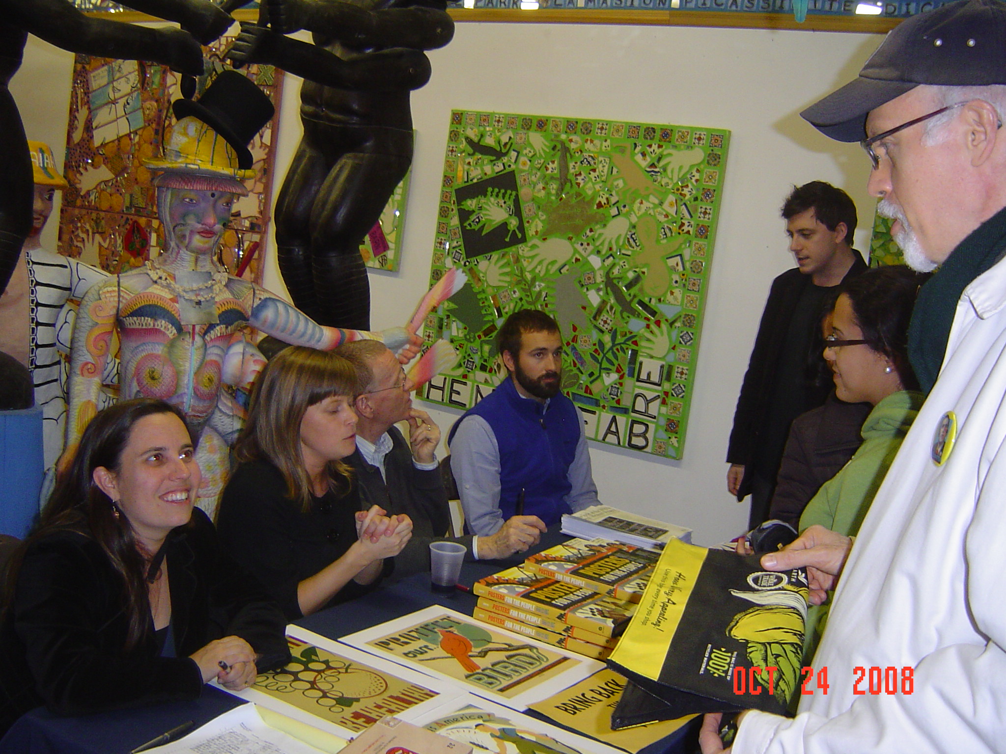 2008 Posters for the People Book Launch. From left to right: Ennis Carter, Cara Cox, Chris DeNoon & Alex Peltz