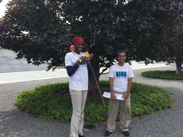 Fatima, Urban Assembly HS for Emergency Management, and Jamil, Urban Assembly HS – Bronx Academy of Letters, take tree readings at the Park. 