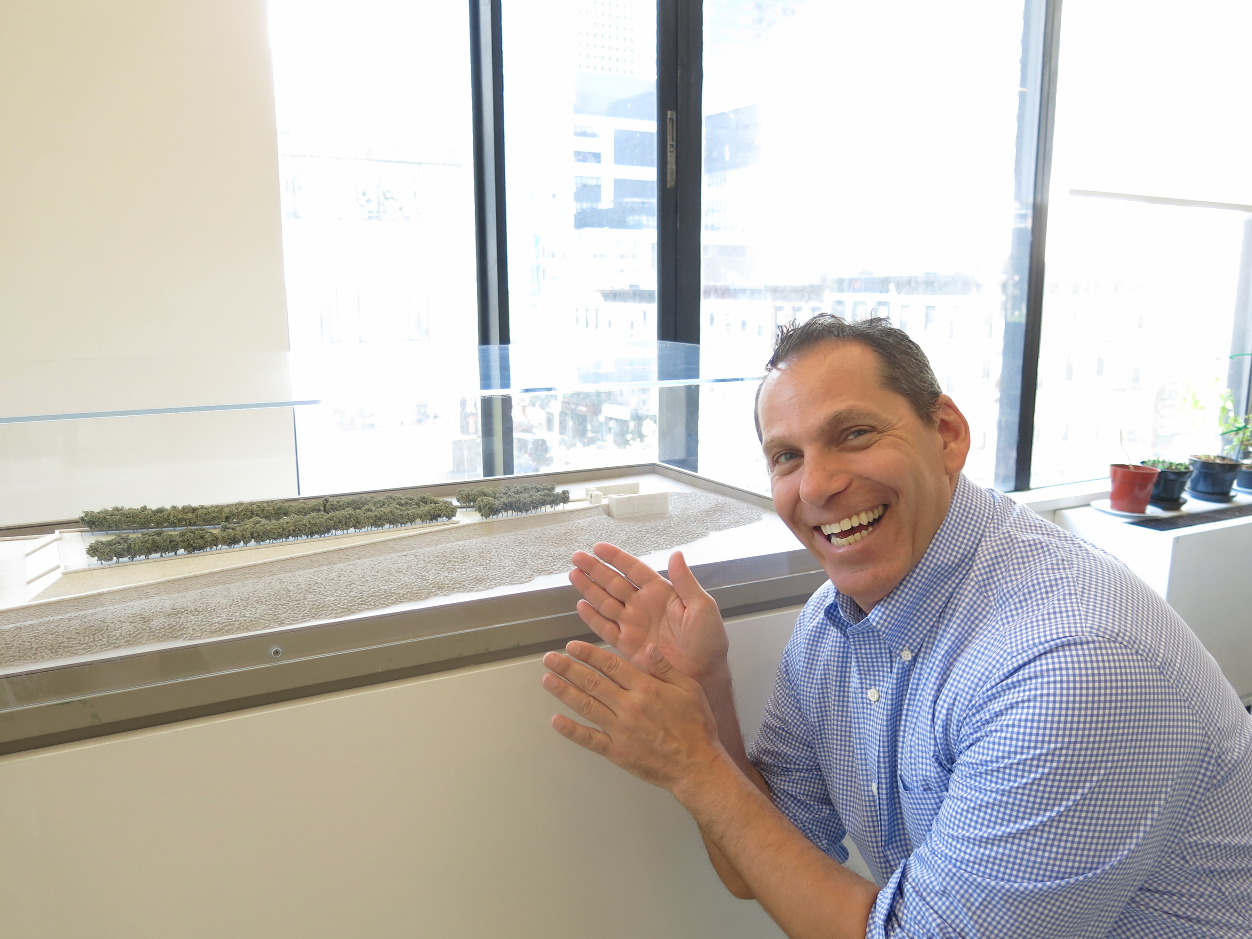 Howard Axel, VP of Development, with a model of Four Freedoms Park