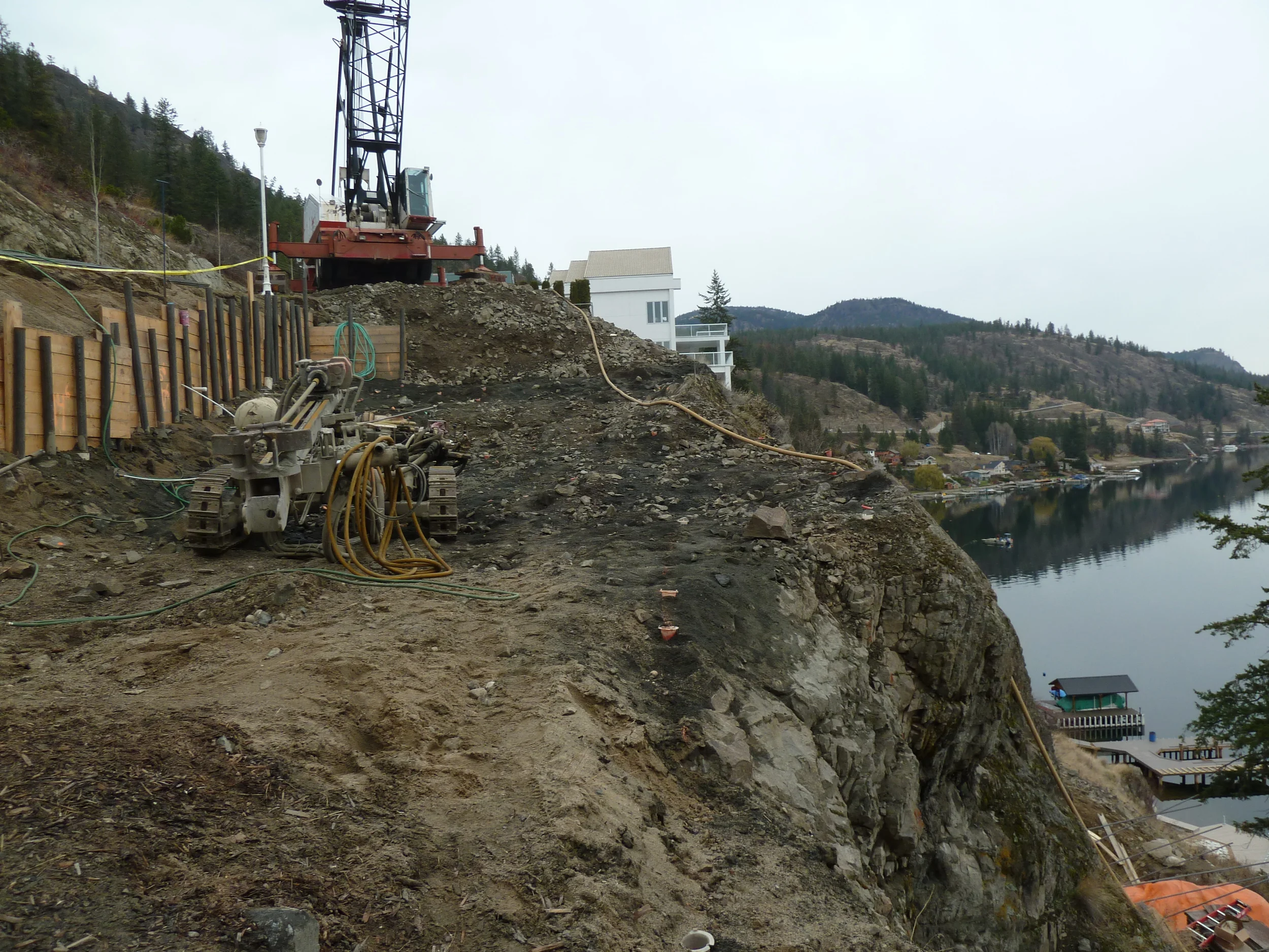 The site required a temporary shoring wall to support the roadway and existing services.