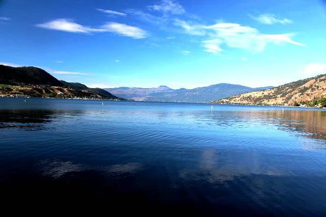   Located directly across from Okanagan Lake!!!! This 5 unit townhouse    development features outstanding contemporary architecture. Less than     a block from Kin beach!!  