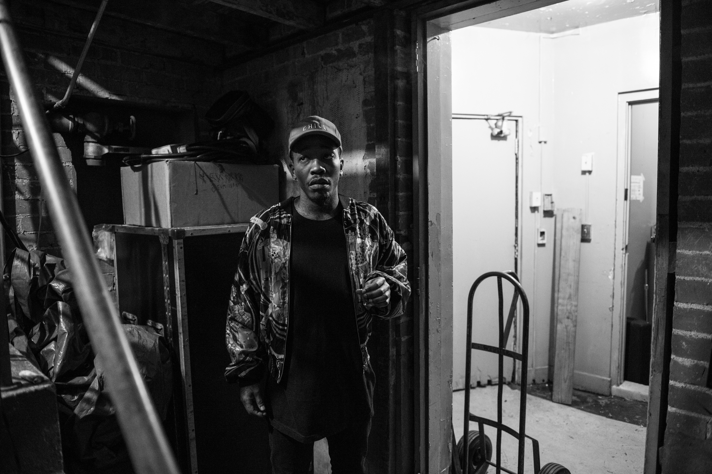 Dizzy smoking a blunt waiting to go on stage