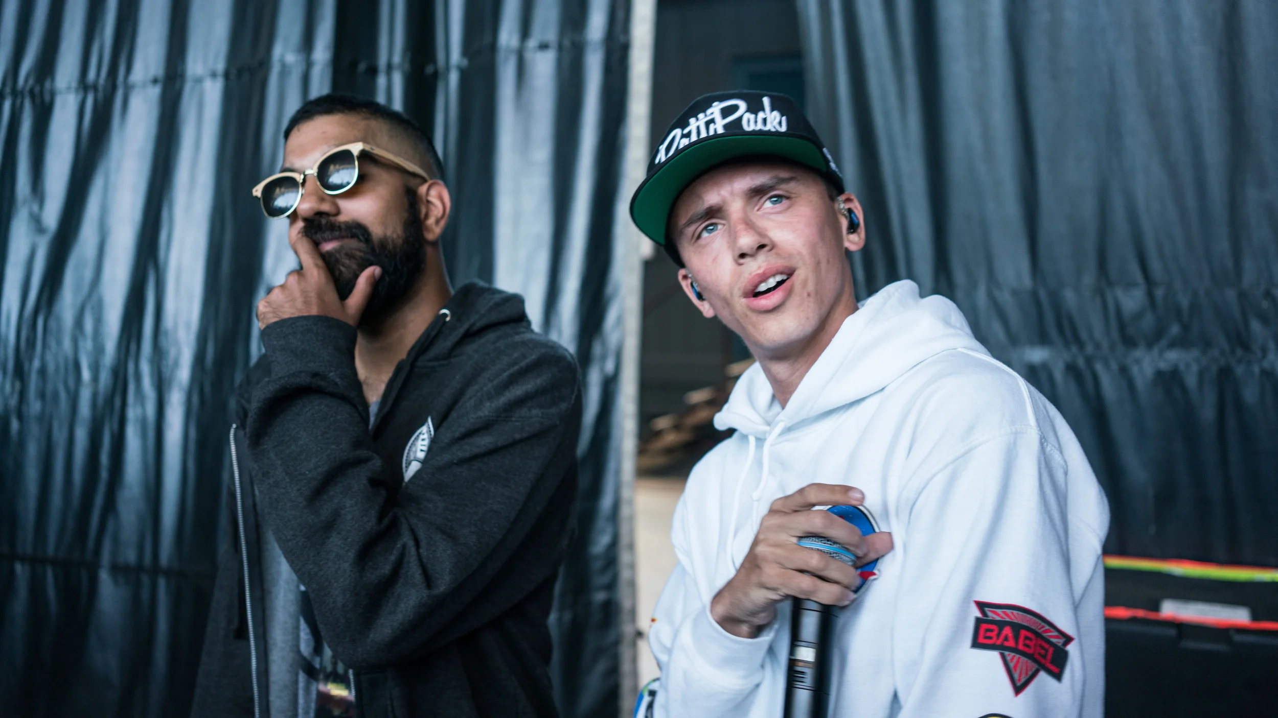 Logic and 6ix backstage before a show in Sacramento