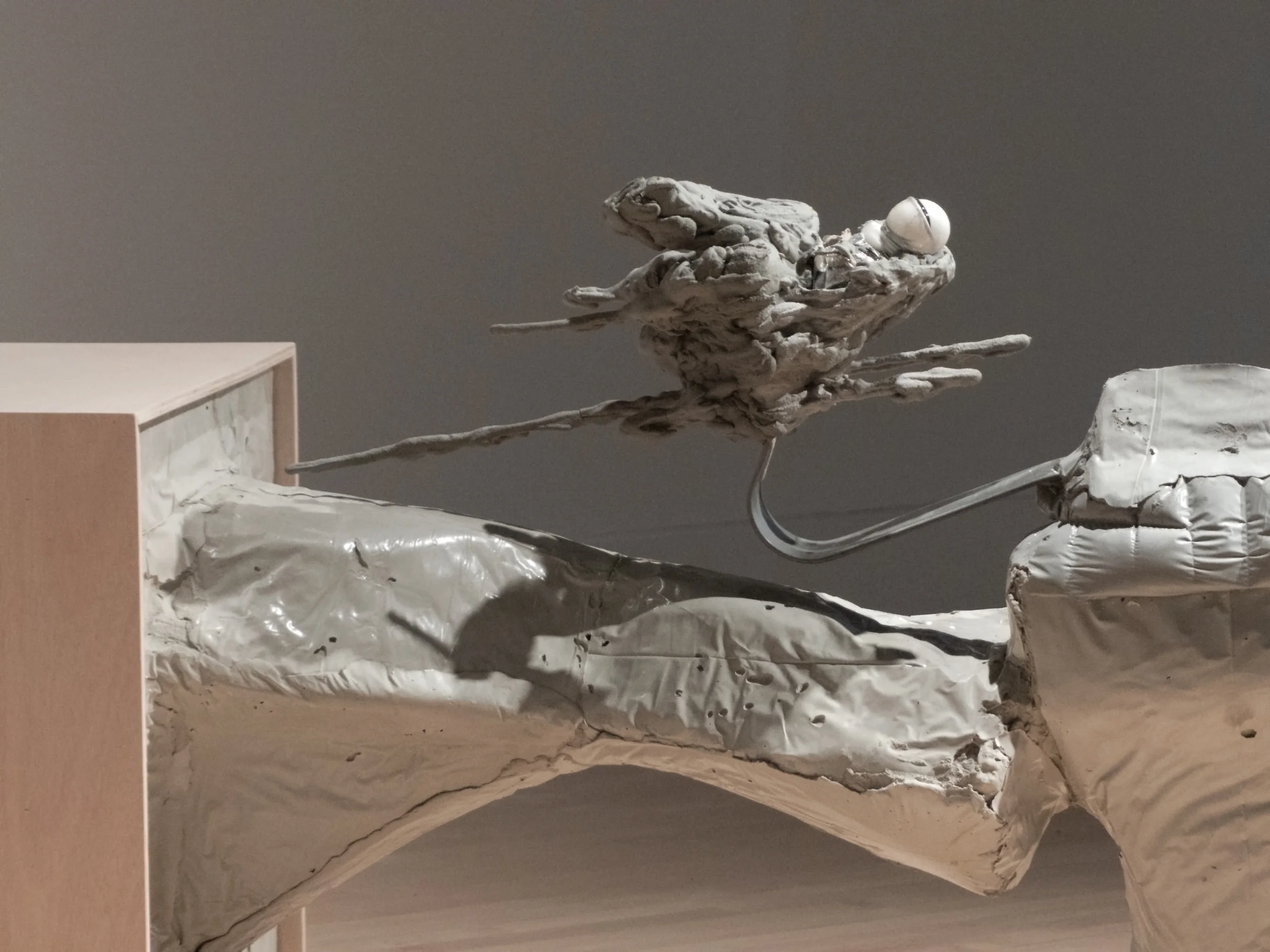 Staging Two: The Stasis: Umbilical , (detail) 2016. Concrete, wire, wood, fabric, resin, and steel. 32 x 76 x 25 in.