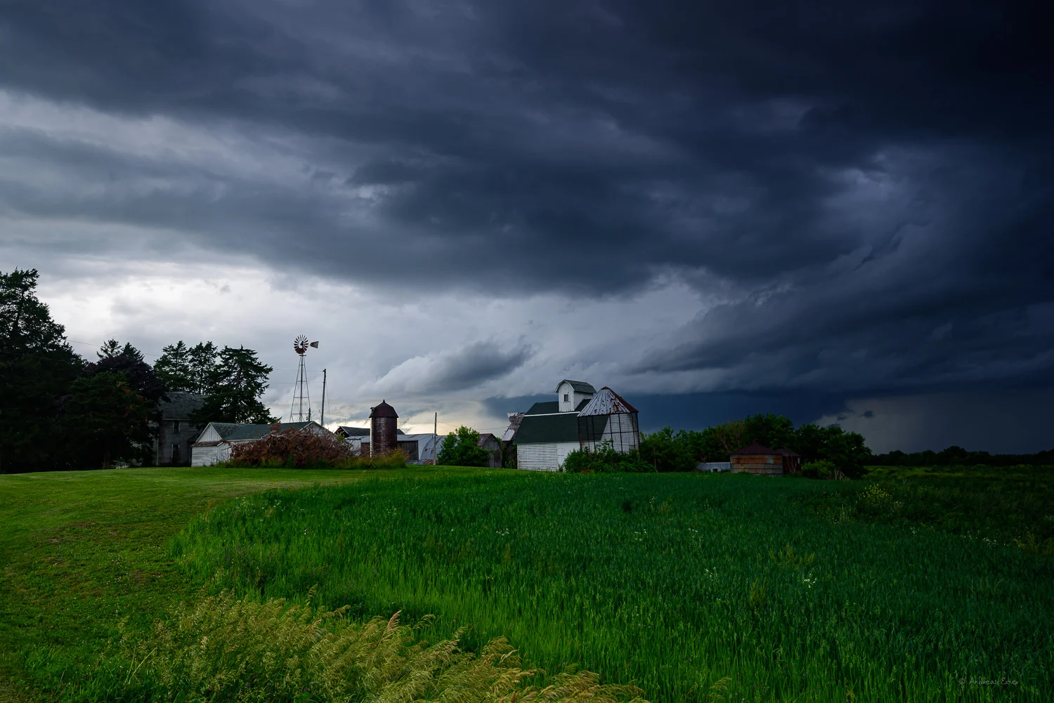 Farm on a hill with clouds, near Sherrill, Iowa