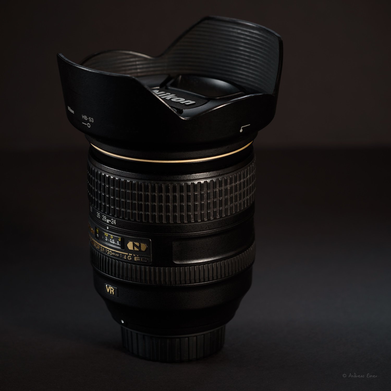  NIKON AF-S NIKKOR 24-120mm f/4G ED VR  This was my walk-around lens for over ten years and many different occasions. The lens is sharp. The only thing I always disliked was the lens creep that occurs easily if you carry the lens with the front eleme