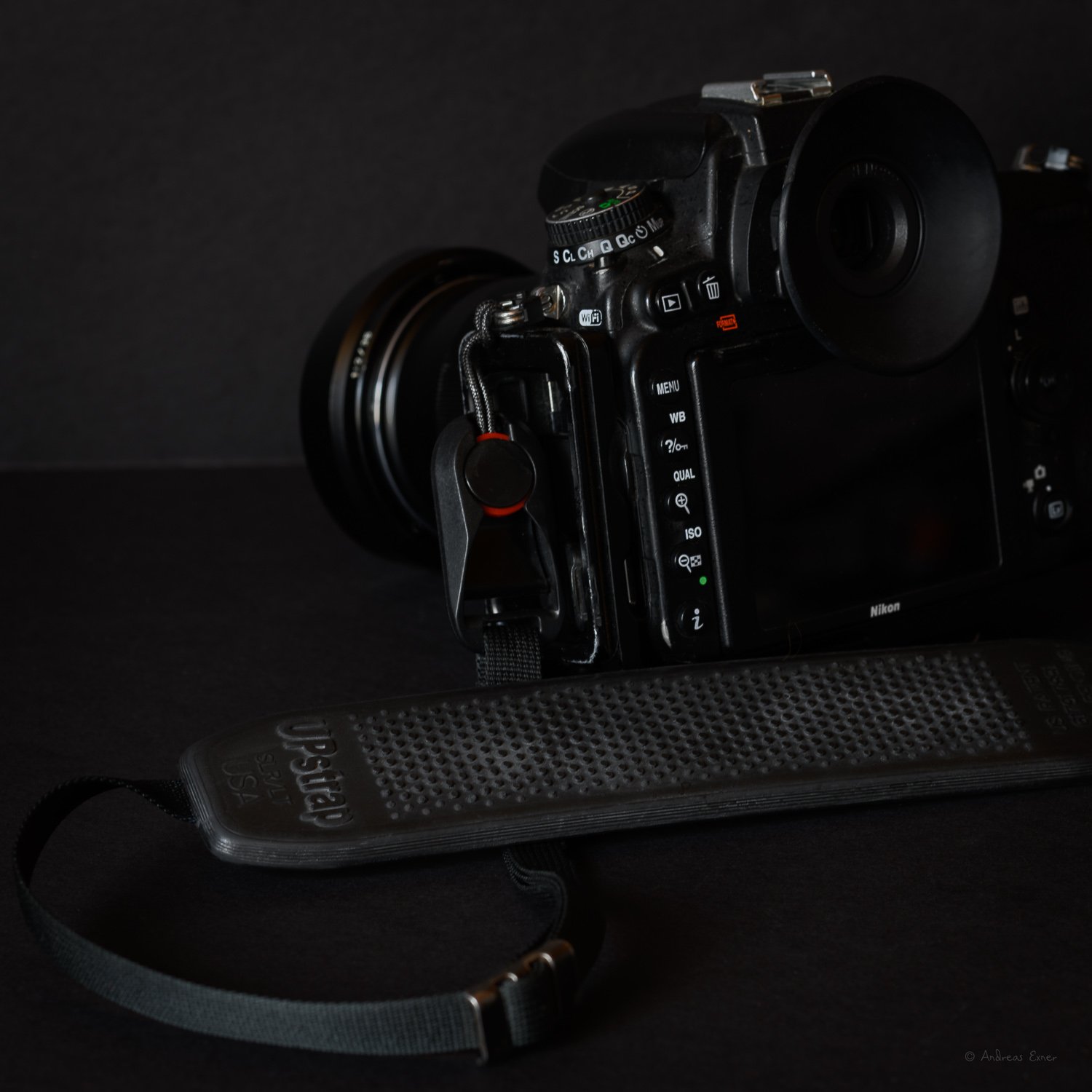 UPstrap Sure-grip shoulder strap  Double-sided non-slip strap that stays on the shoulder even with a heavier camera / lens combo.  ★ ★ ★ ★  Peak Design AL-4 Anchor Links  I have a set on each camera. The anchor links allow to detach the shoulder str