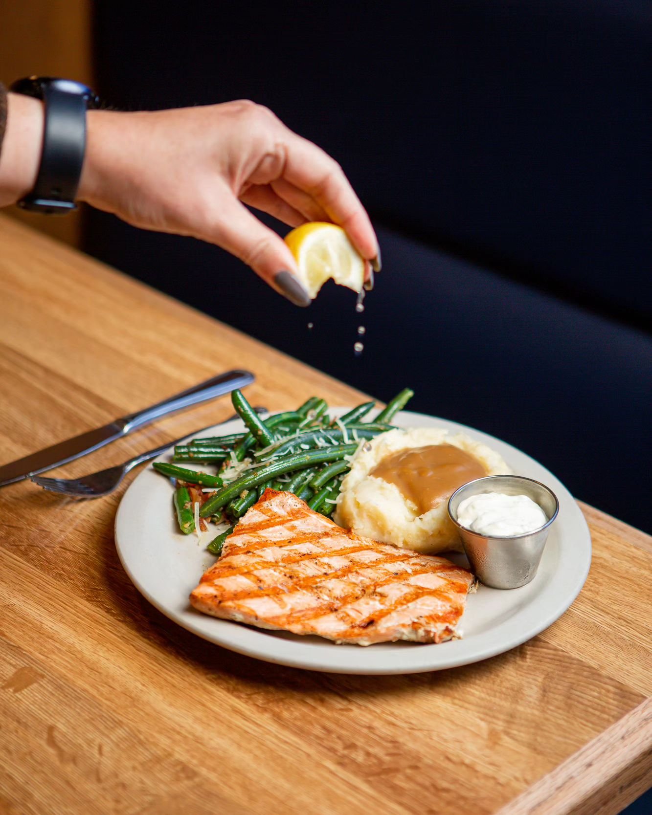 A little squeeze of lemon for an extra kick of flavor!  Does this plate look good or what?

Wild Alaskan Coho salmon grilled to perfection, served with vegetable, soup or salad and choice of potato. 

#seafood #cohosalmon #salmonrecipe #seafoodlovers