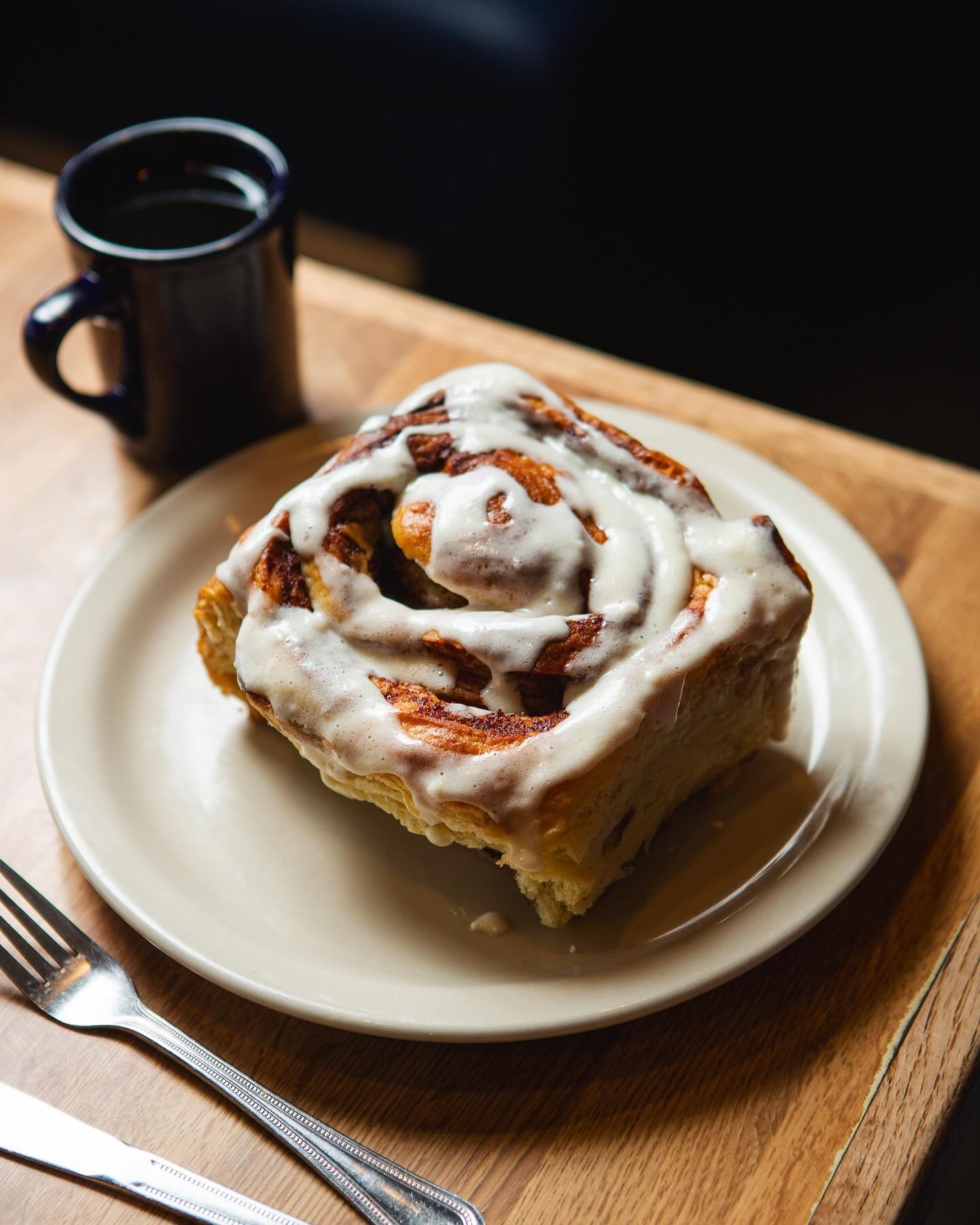 Introducing our new Cinnamon Rolls! Our new standard cinnamon roll is huge and gooey and topped with cream cheese icing. The perfect cinnamon roll. We took that and filled it with bacon chunks and cinnamon inside and then topped with maple icing and 