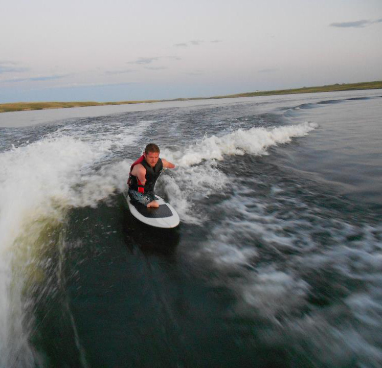 Chris surfing solo.jpg