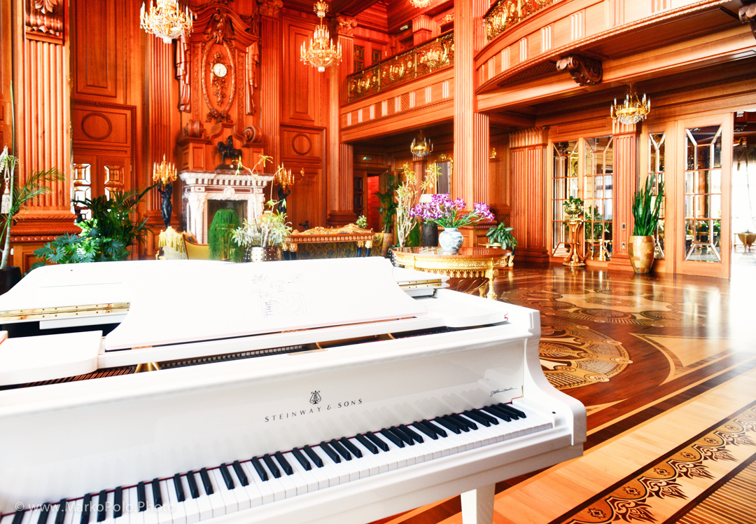 Main room with a fireplace and 17 variety wood floors. A Steinway & Sons limited edition 'Imagine' grand piano in a reception room. Retailing at £77,200 in 2011 and taking a year to make, the piano is modeled after the white Steinway that John Lennon presented to Yoko Ono on her birthday in 1971 and which featured in Lennon's iconic video for the peace song of the same name. (http://www.telegraph.co.uk)