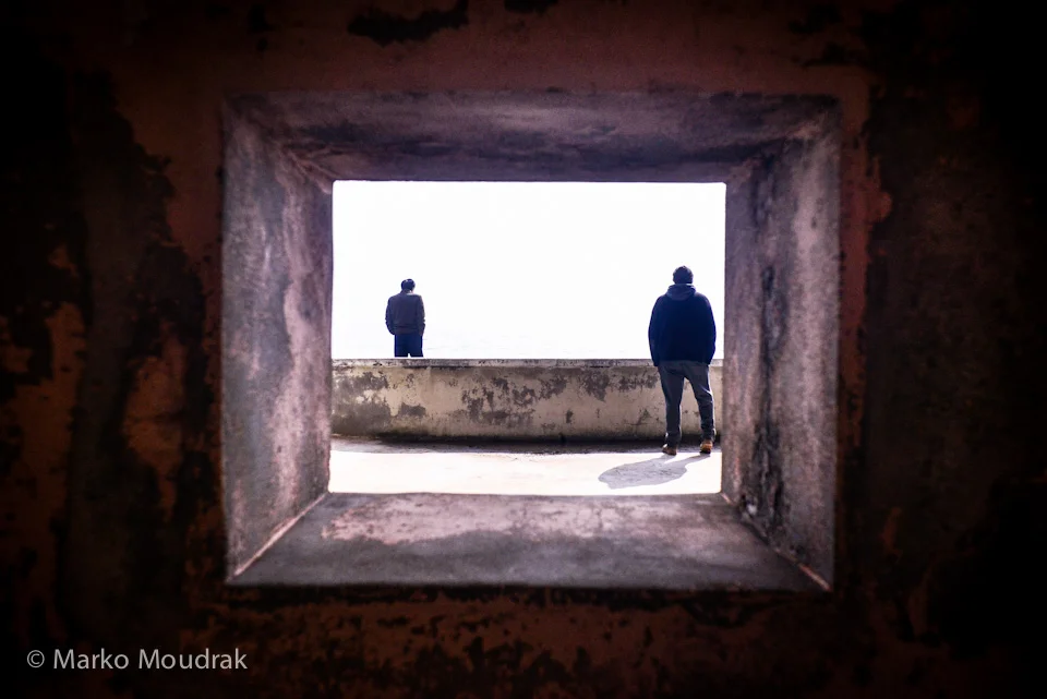 Looking out of what looks like an abandoned bunker into Sea of Japan, aka Sea of Korea