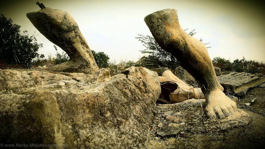 A giant statue of a man once stood in this fountain...only the legs are left