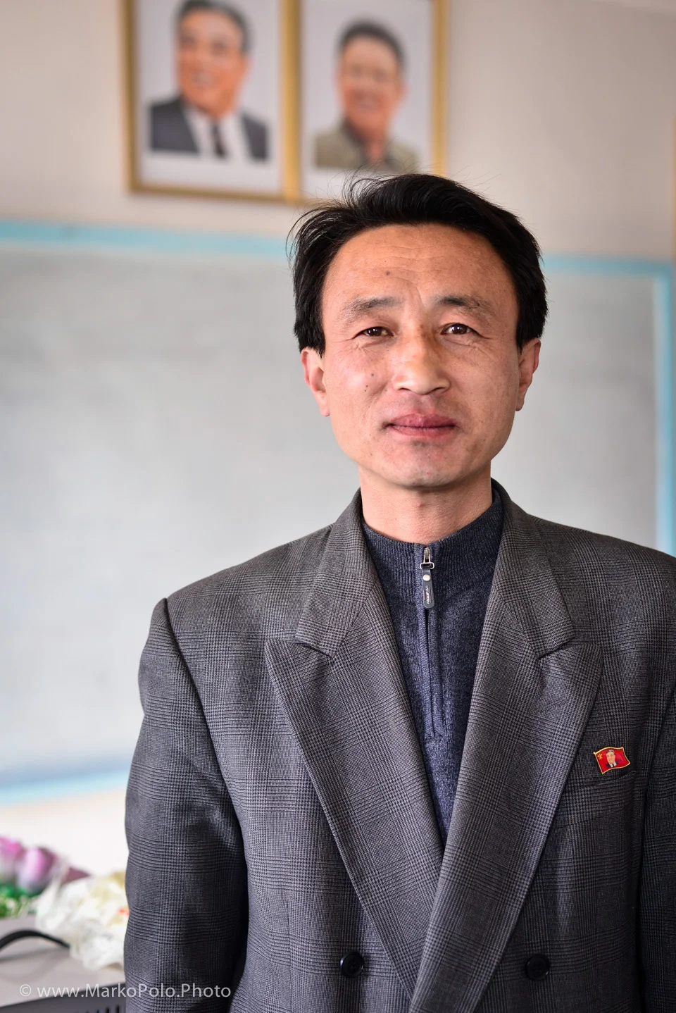 Class teacher. He kept smiling all the time but a second I asked him to pose for me his smile was gone