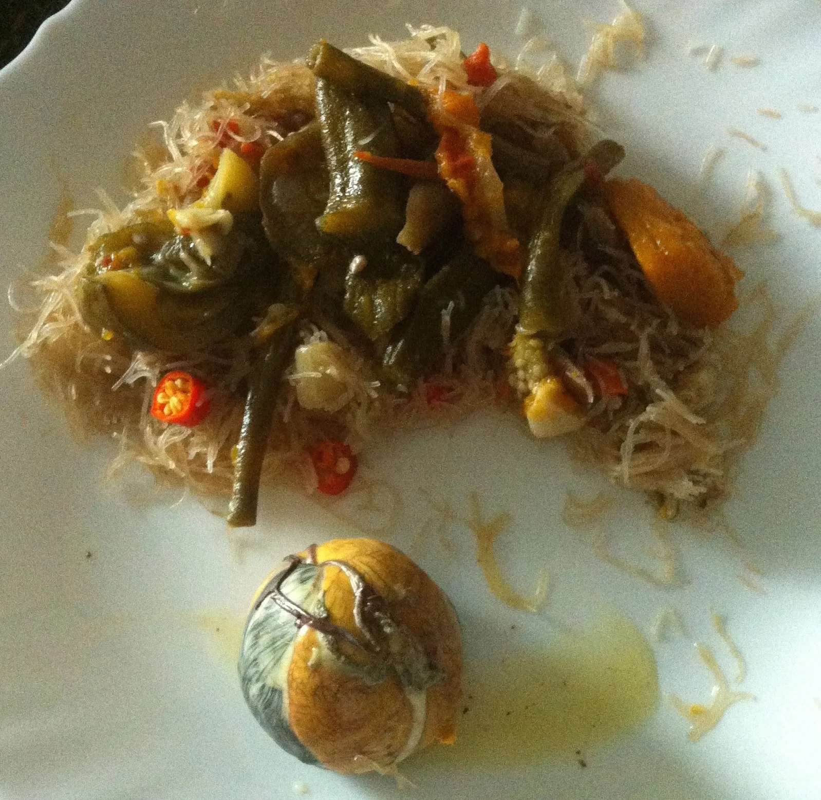 One of my standard breakfasts: pancit with assorted vegetables and a balut on the side.&nbsp;