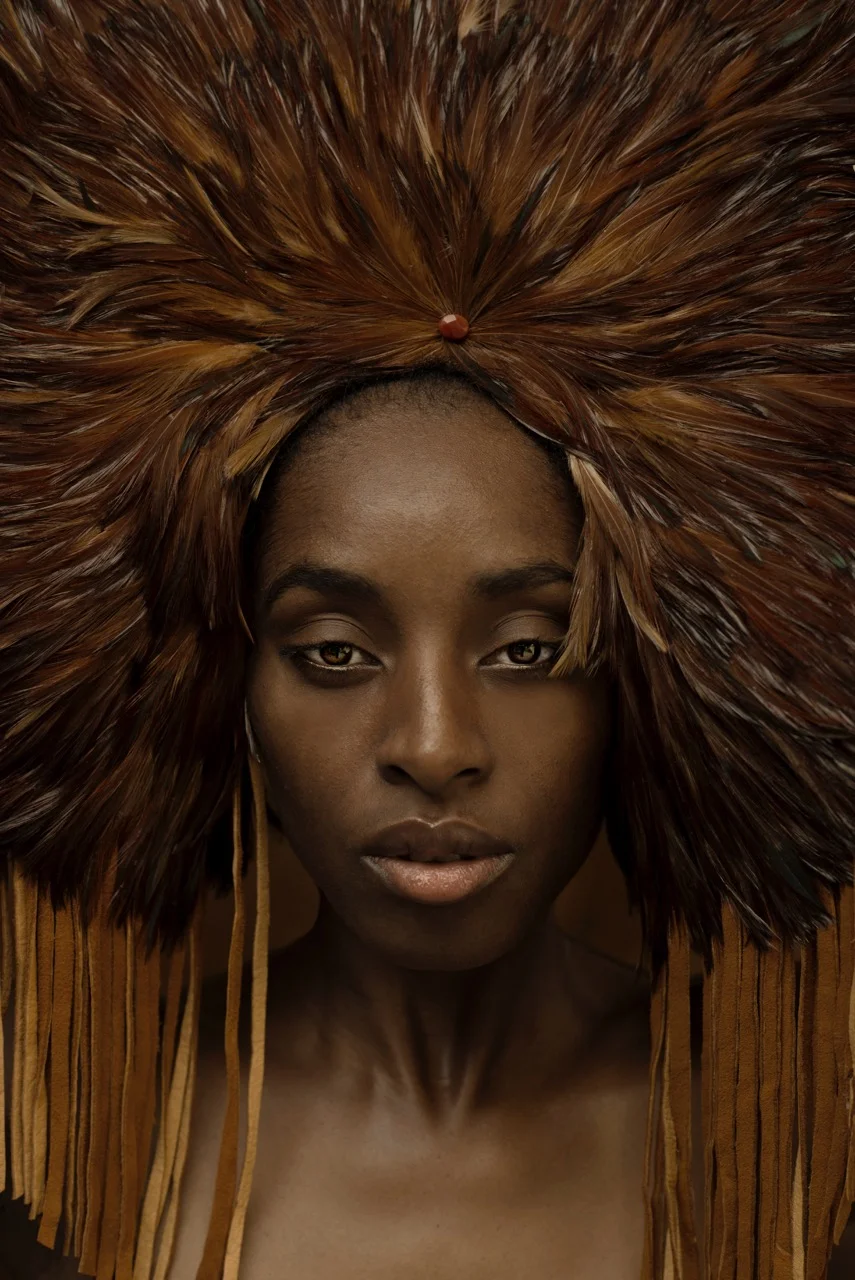 NICKI MARX, feather wear, photographed by PHILLIP DIXON