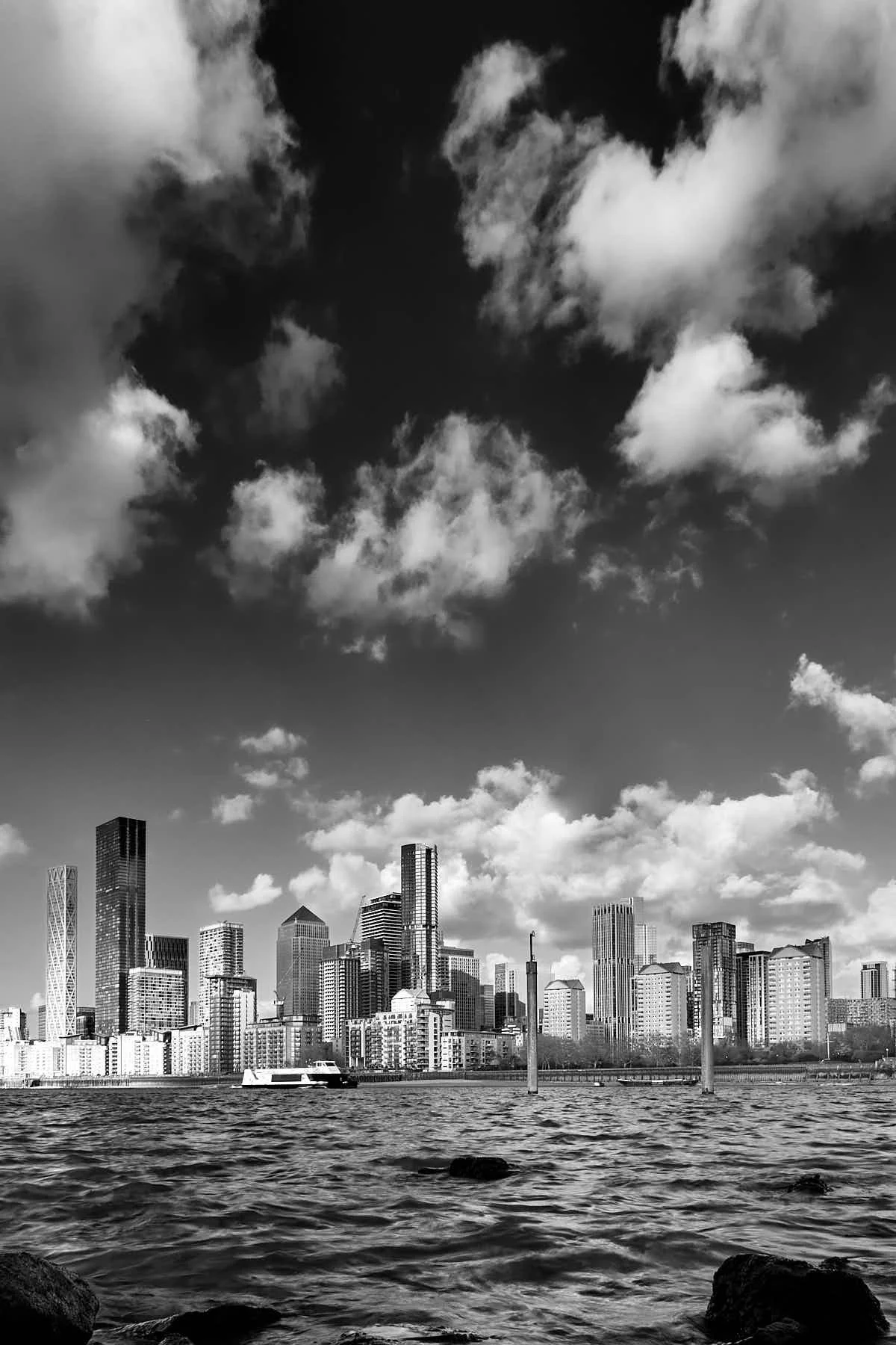 Black and white image of the London Docklands seen across the river Thames