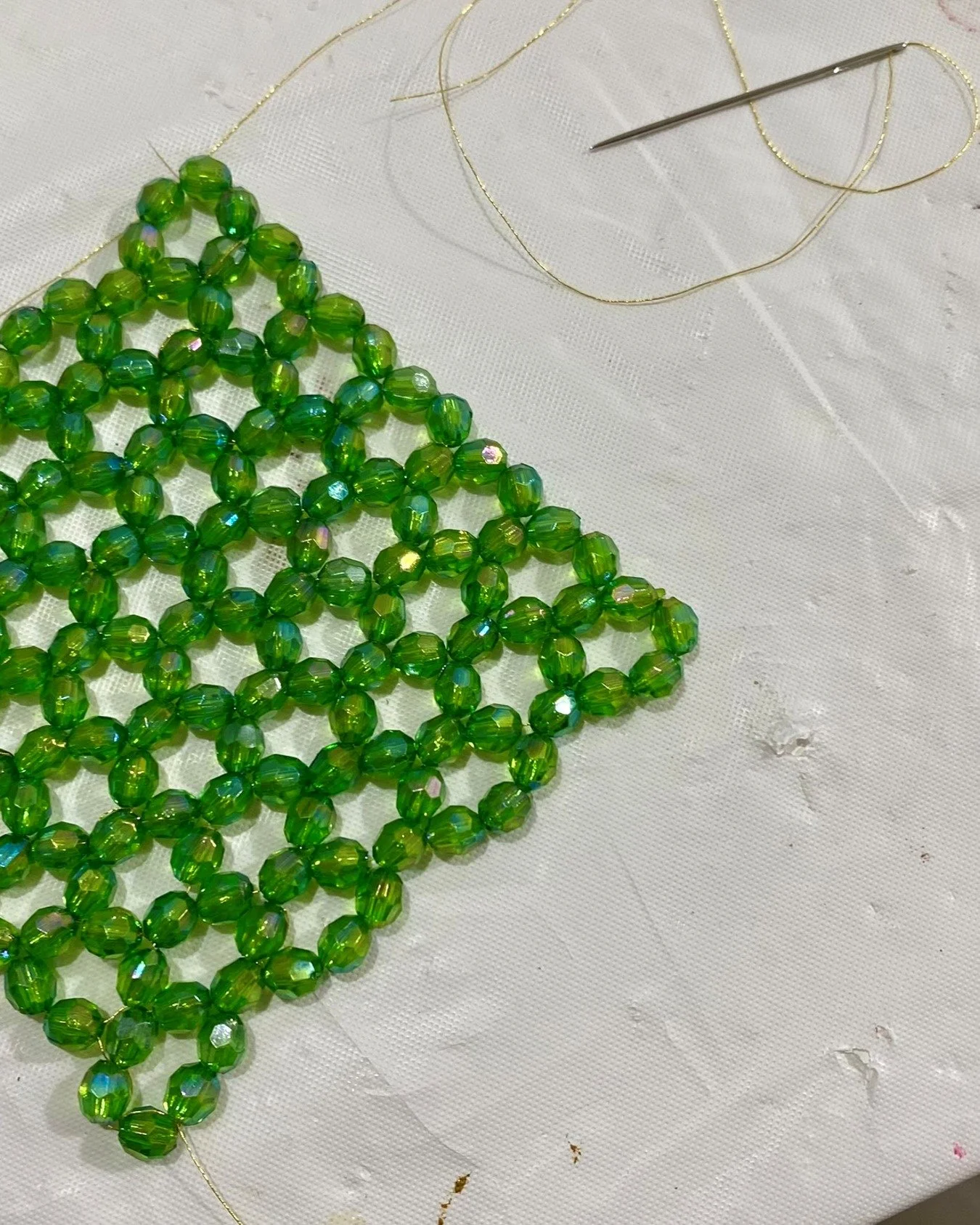 One of the first techniques I learned for my upcoming art show: bead netting. 

It&rsquo;s kinda tedious&mdash;tiny needle, tiny beads, lots of measuring and calculating and counting on repeat&mdash;but after a few false starts (and poked fingers), I