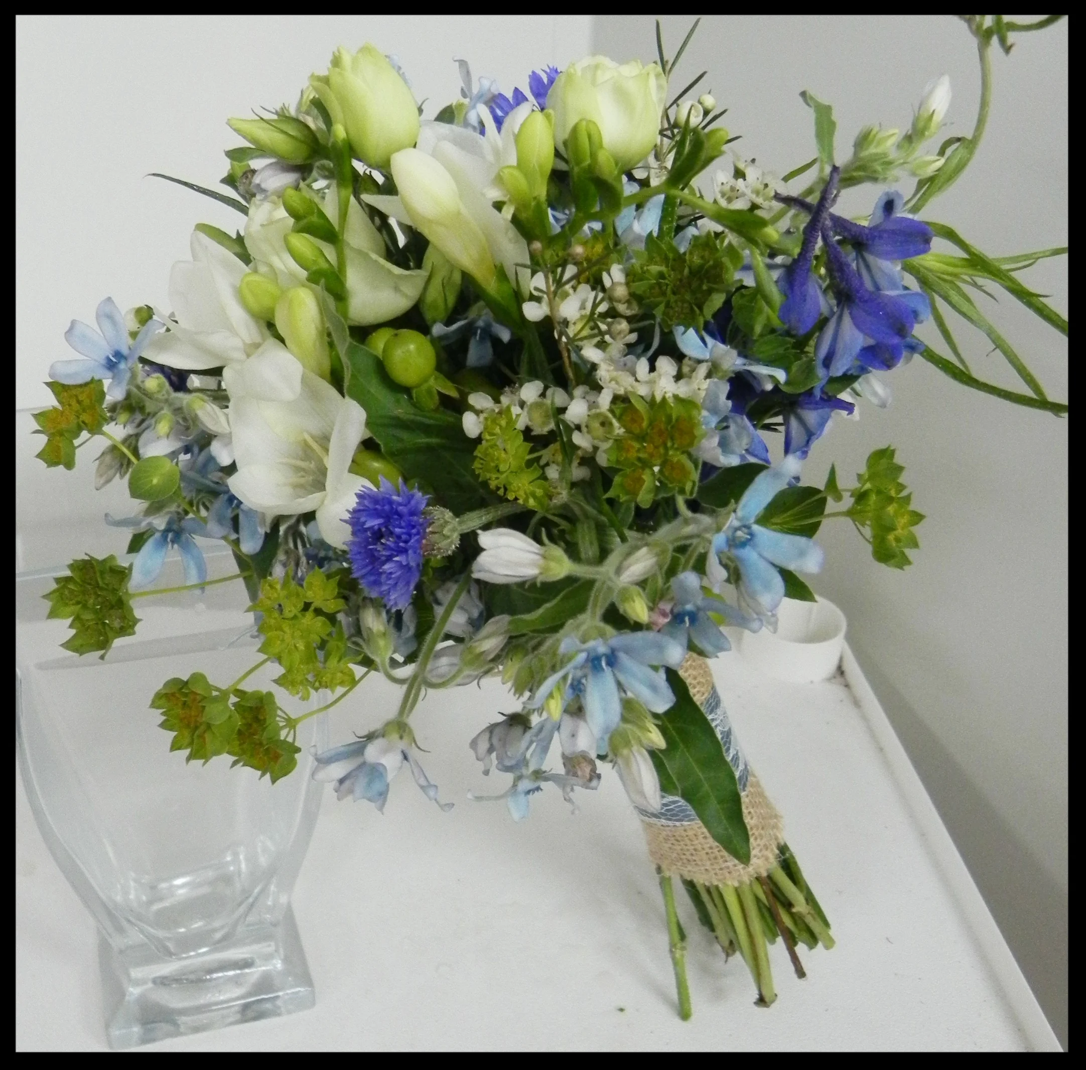 Freesia, Bup., Delph, Wax, Hypericum, And Thistle.jpg