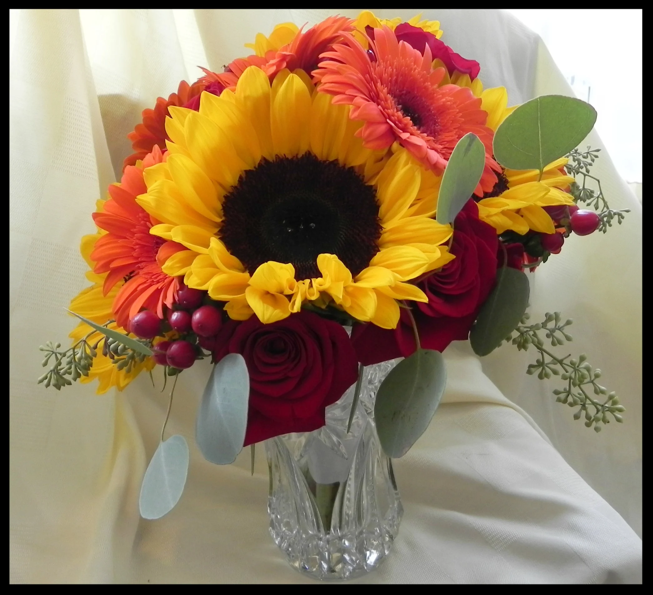 Sunflowers, Gerbs, Roses, Hypericum and Seeded Euc.jpg