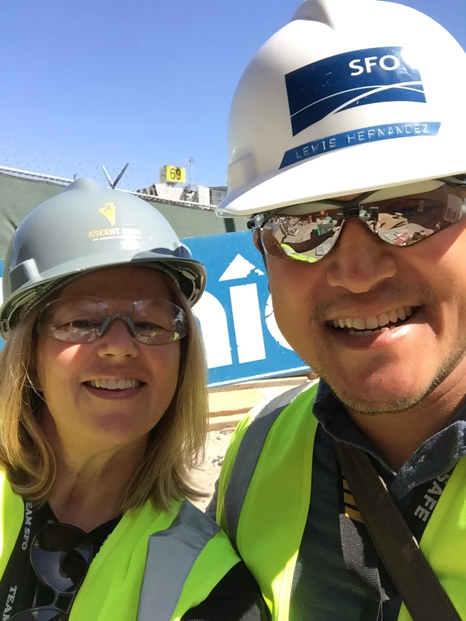 One must be properly outfitted before entering the heavy construction area. Behind the scenes with Lewis.
