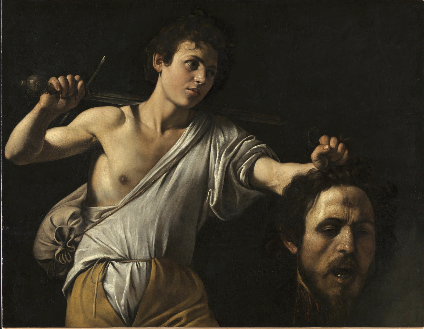 Caravaggio, David with the Head of Goliath , c. 1607 (Um, what's with his shirt, pants and the opening of his shoulder bag?)