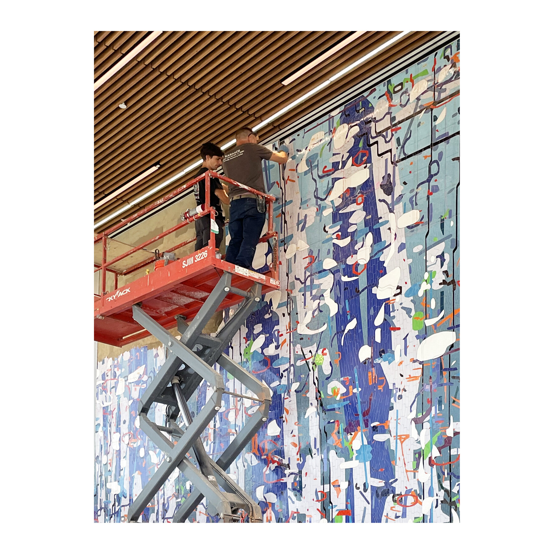  [installation]  Large Variation: Blue,  2021 Ceramic mosaic 26 x 26 feet  Sam Houston State University, College of Osteopathic Medicine Building, Conroe, Texas 