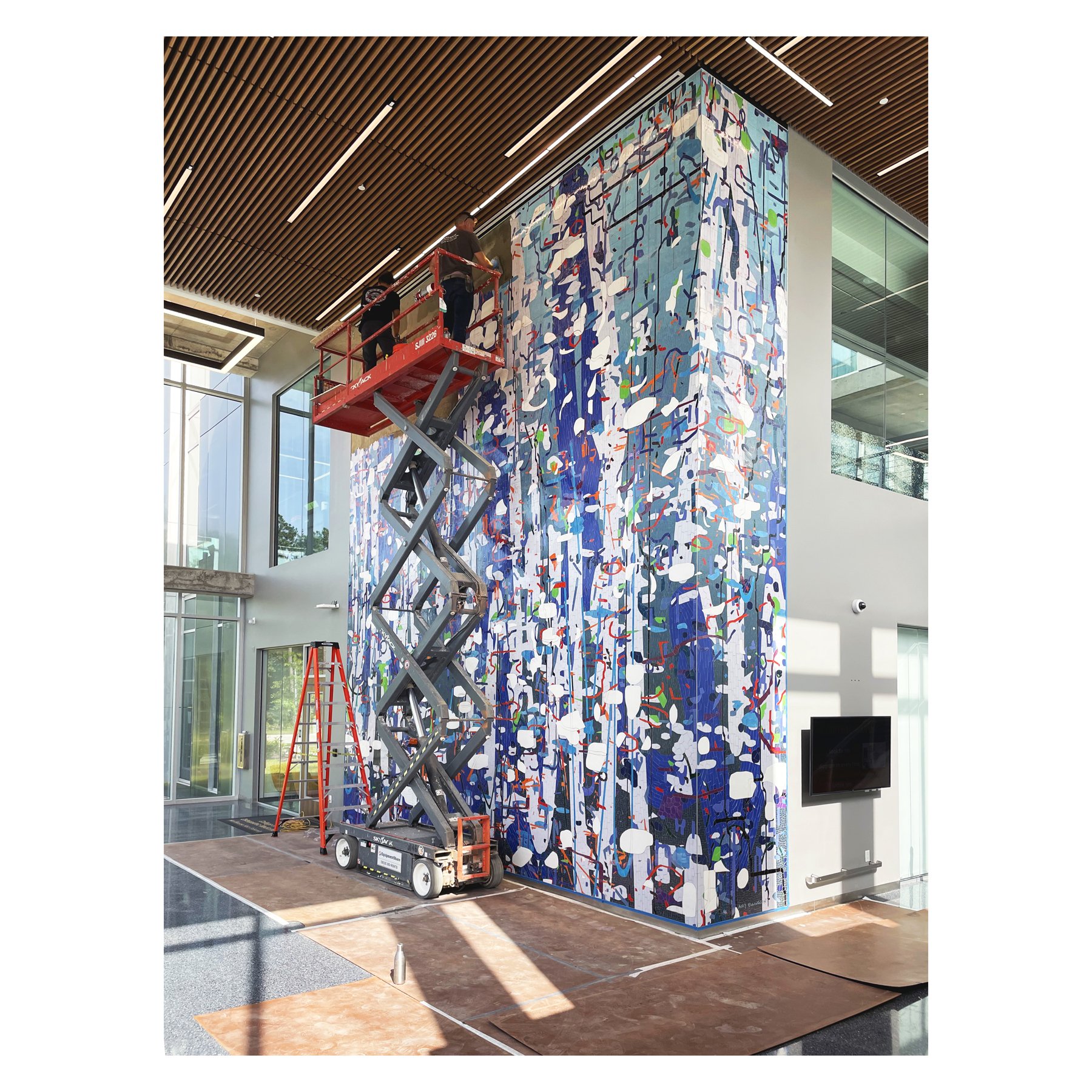  [installation]  Large Variation: Blue , 2021 Ceramic mosaic 26 x 26 feet  Sam Houston State University, College of Osteopathic Medicine Building, Conroe, Texas 
