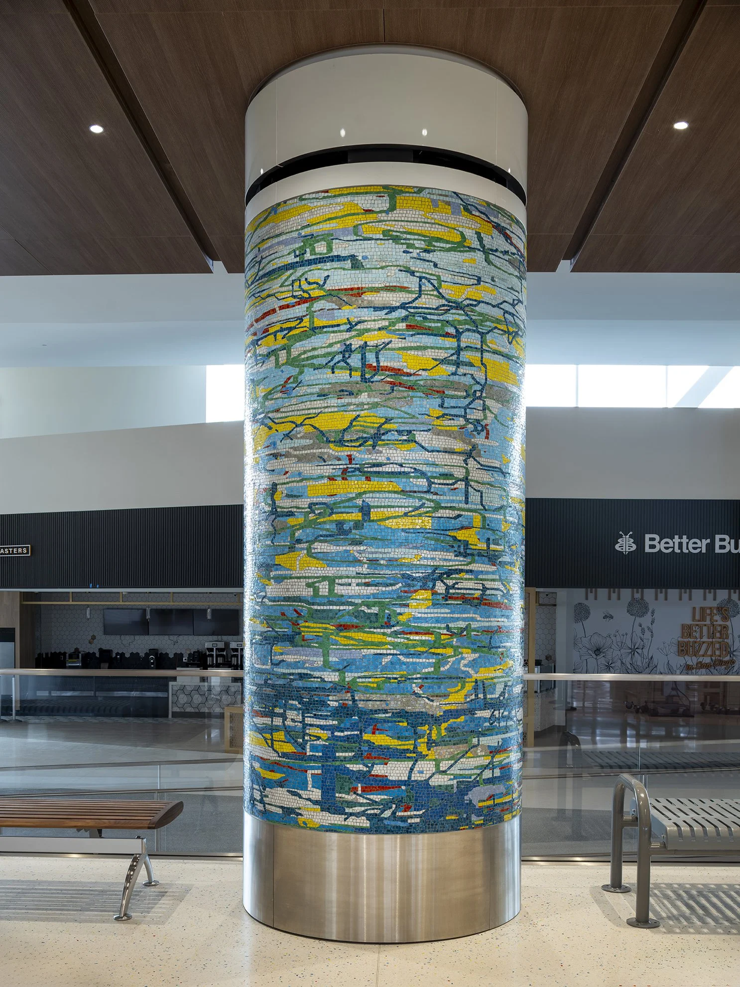 A Day in the Sun , 2025 Glass mosaic on six columns, terrazzo floor Each 54 inches in diameter, 120 inches high New Terminal 1 San Diego International Airport