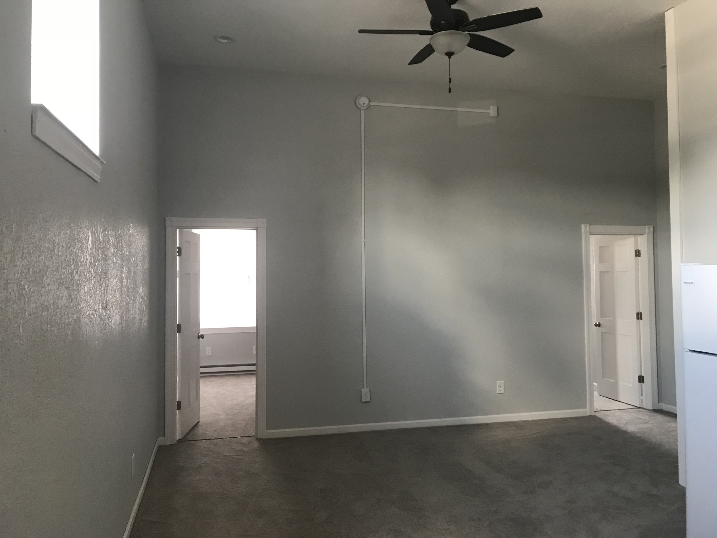 Living Room with Ceiling fan and recessed lights