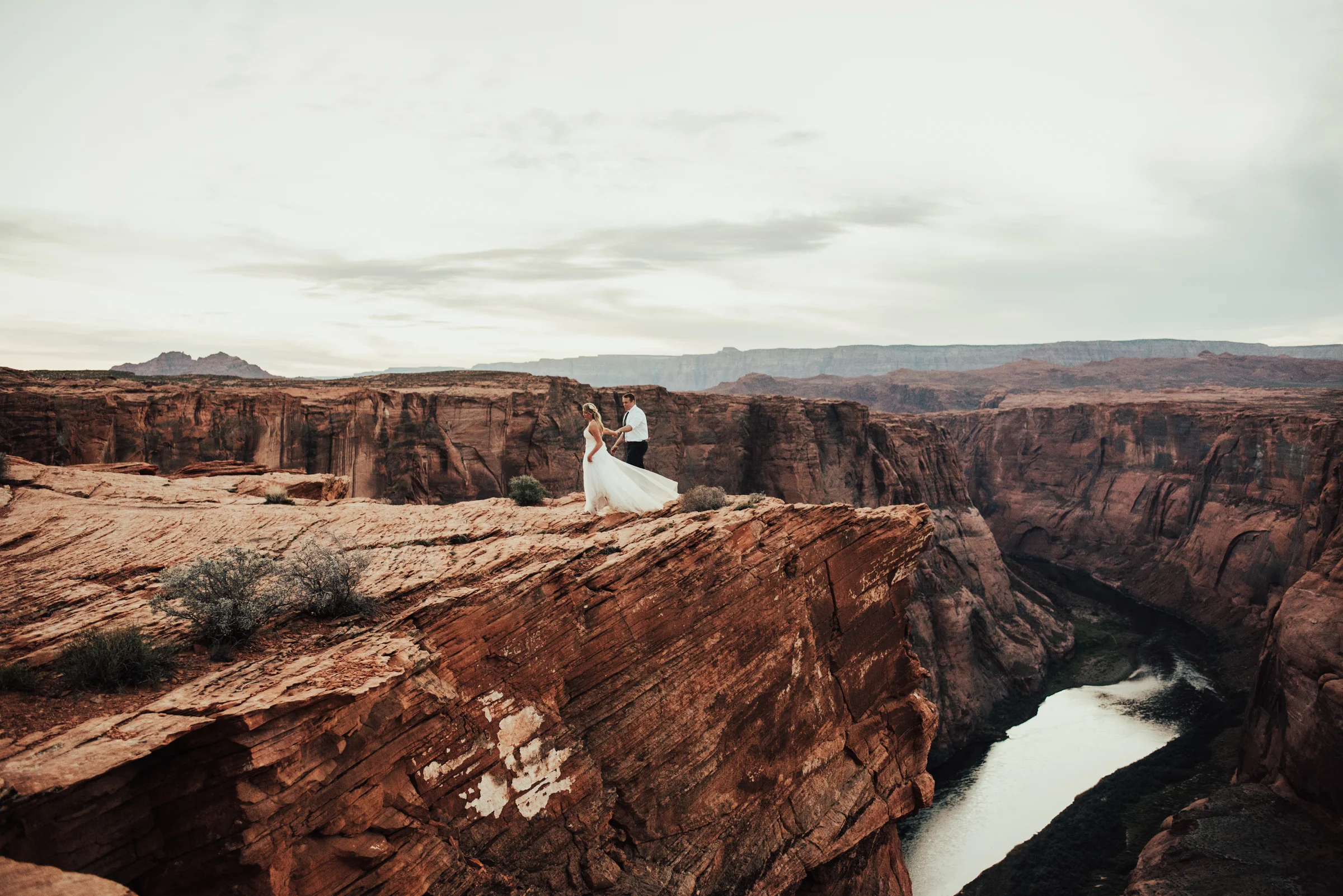 Breathtaking Horseshoe Bend Elopement Portrait of Groom &amp; Bride Photographed by Big Sur Wedding Photographers Tessa Tadlock