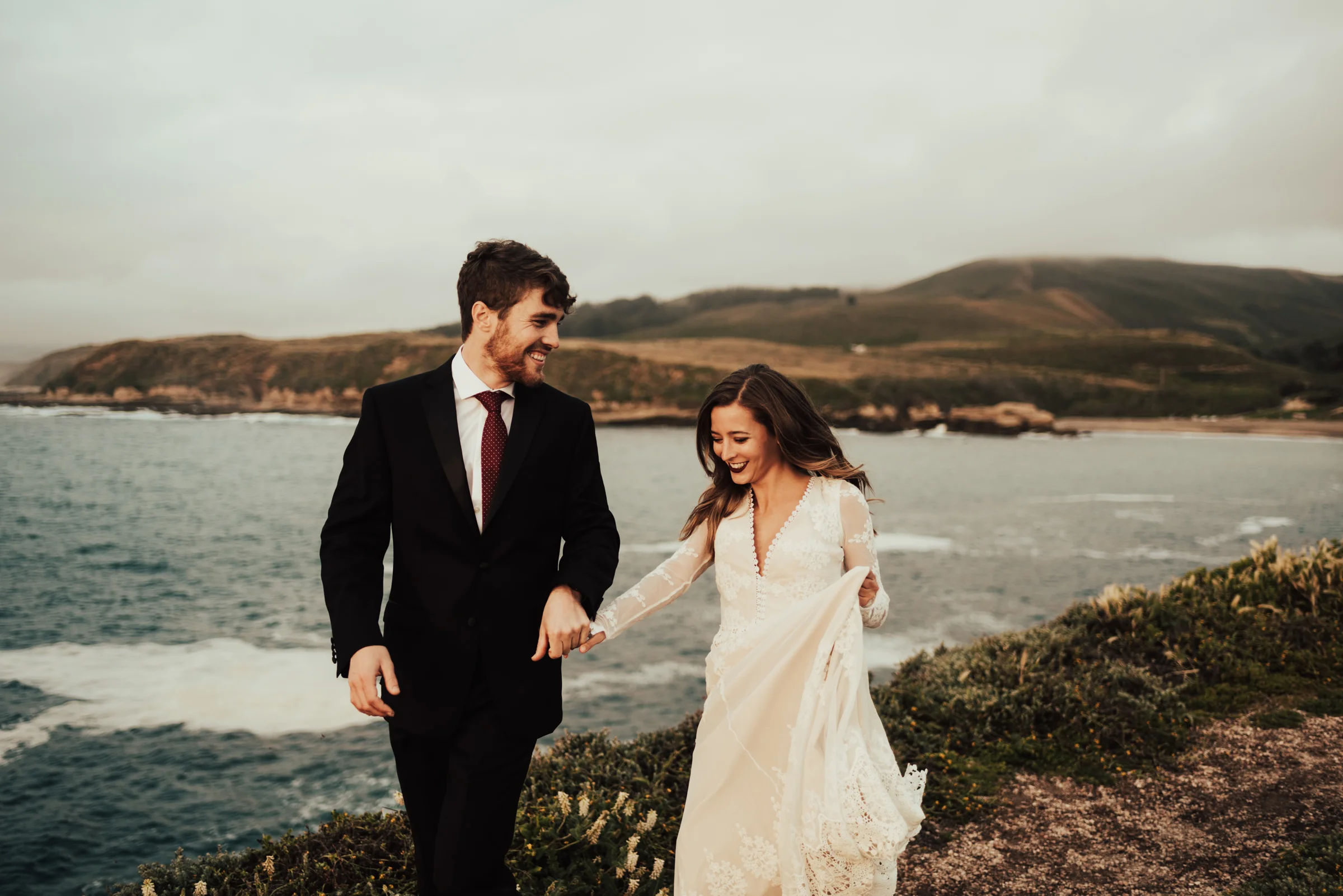 Carefree Groom &amp; Bride Portraits by the Shore Photographed by Big Sur Wedding Photographers Tessa Tadlock