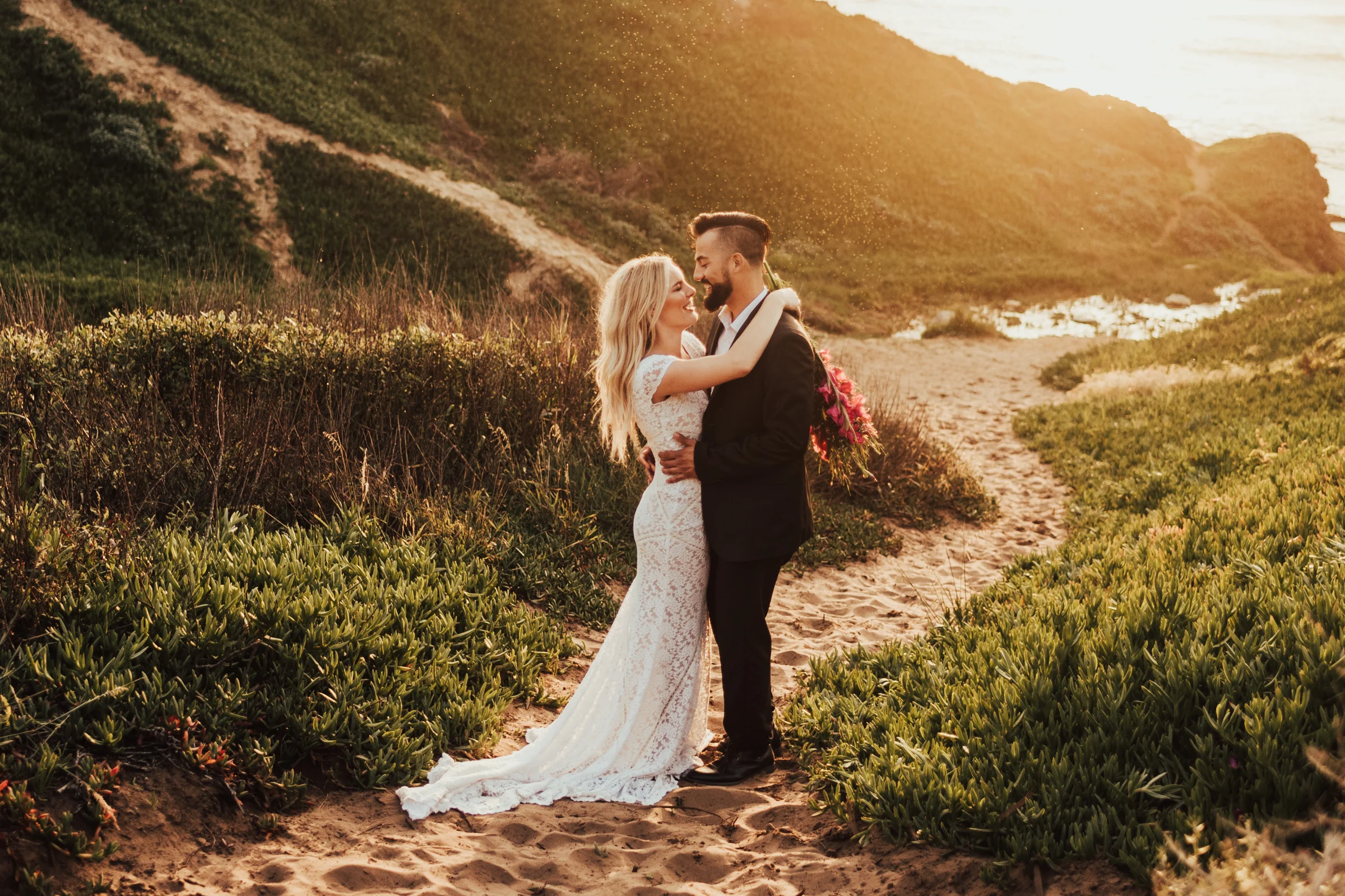 Cliffside Elopement Portraits of Bride &amp; Groom at Sunset Photographed by Big Sur Wedding Photographers Tessa Tadlock