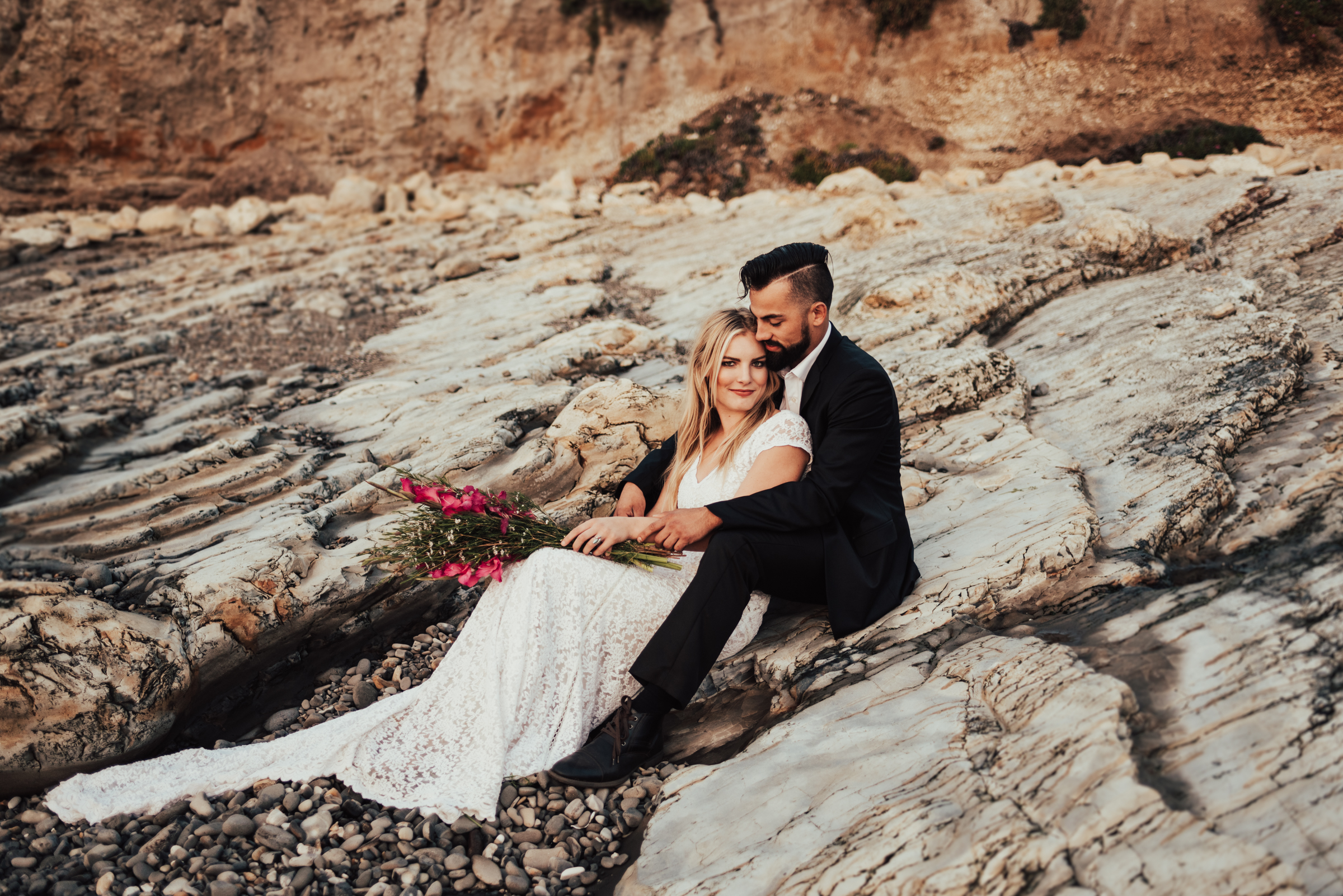 Rocky Beach Elopement Portrait of Bride &amp; Groom Photographed by Big Sur Wedding Photographers Tessa Tadlock 