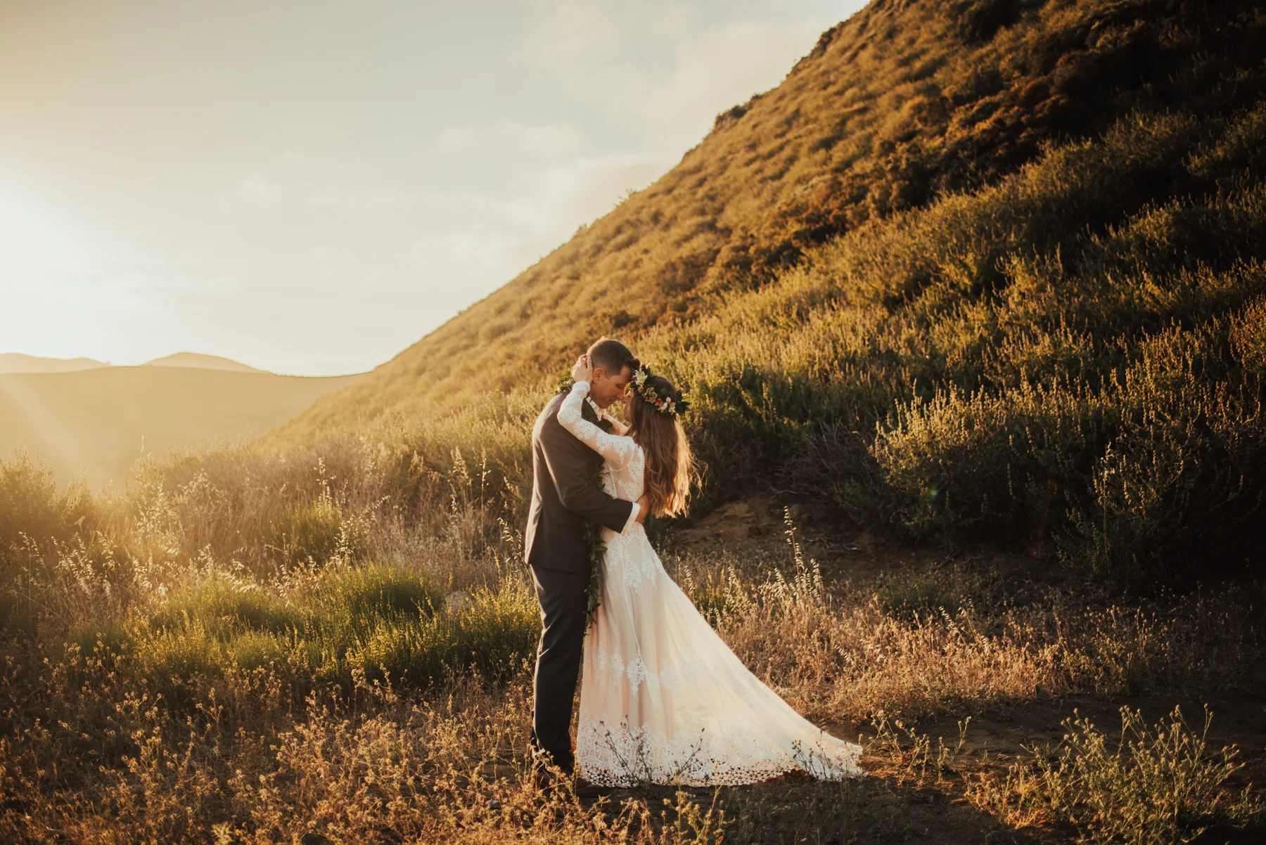 Boho Couple Portrait in Field of Wildflowers photographed by Big Sur Wedding Photographers Tessa Tadlock 