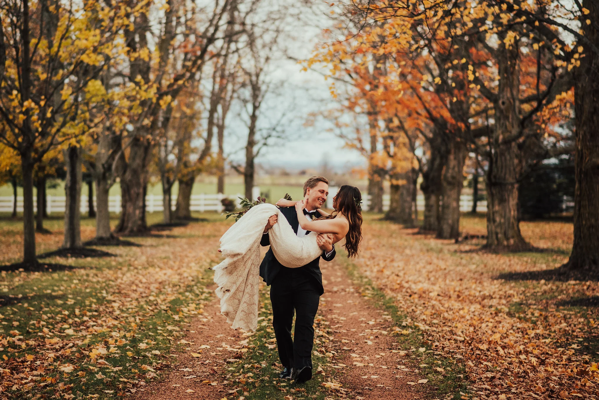 Photographed by Big Sur Wedding Photographers Tessa Tadlock Bride &amp; Groom Portraits on a Tree Lined Street