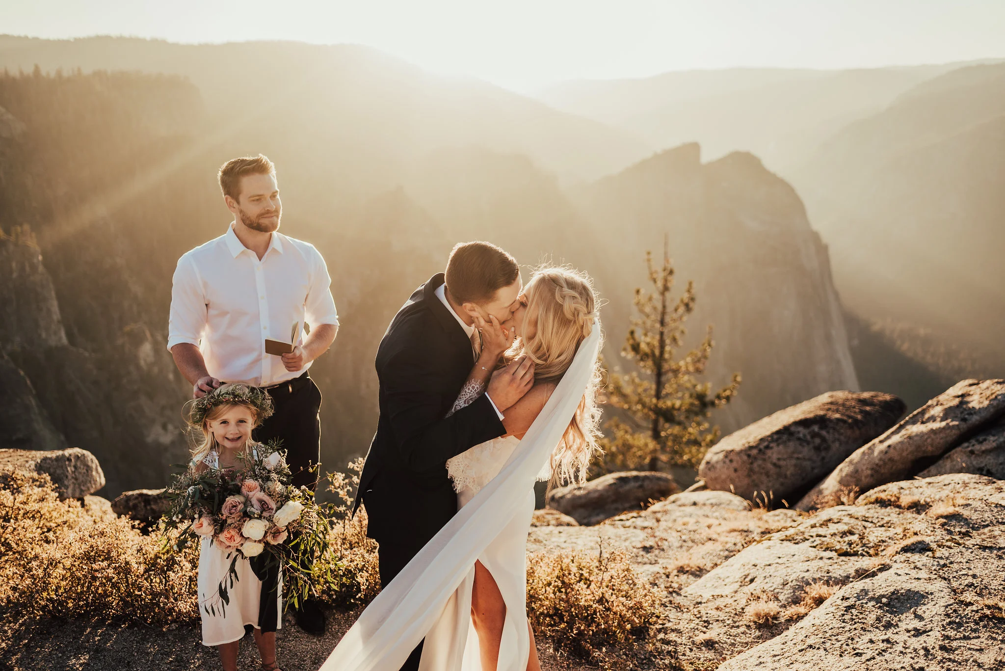 Groom &amp; Bride share their first kiss after Yosemite elopement photographed by Big Sur Wedding Photographers Tessa Tadlock  