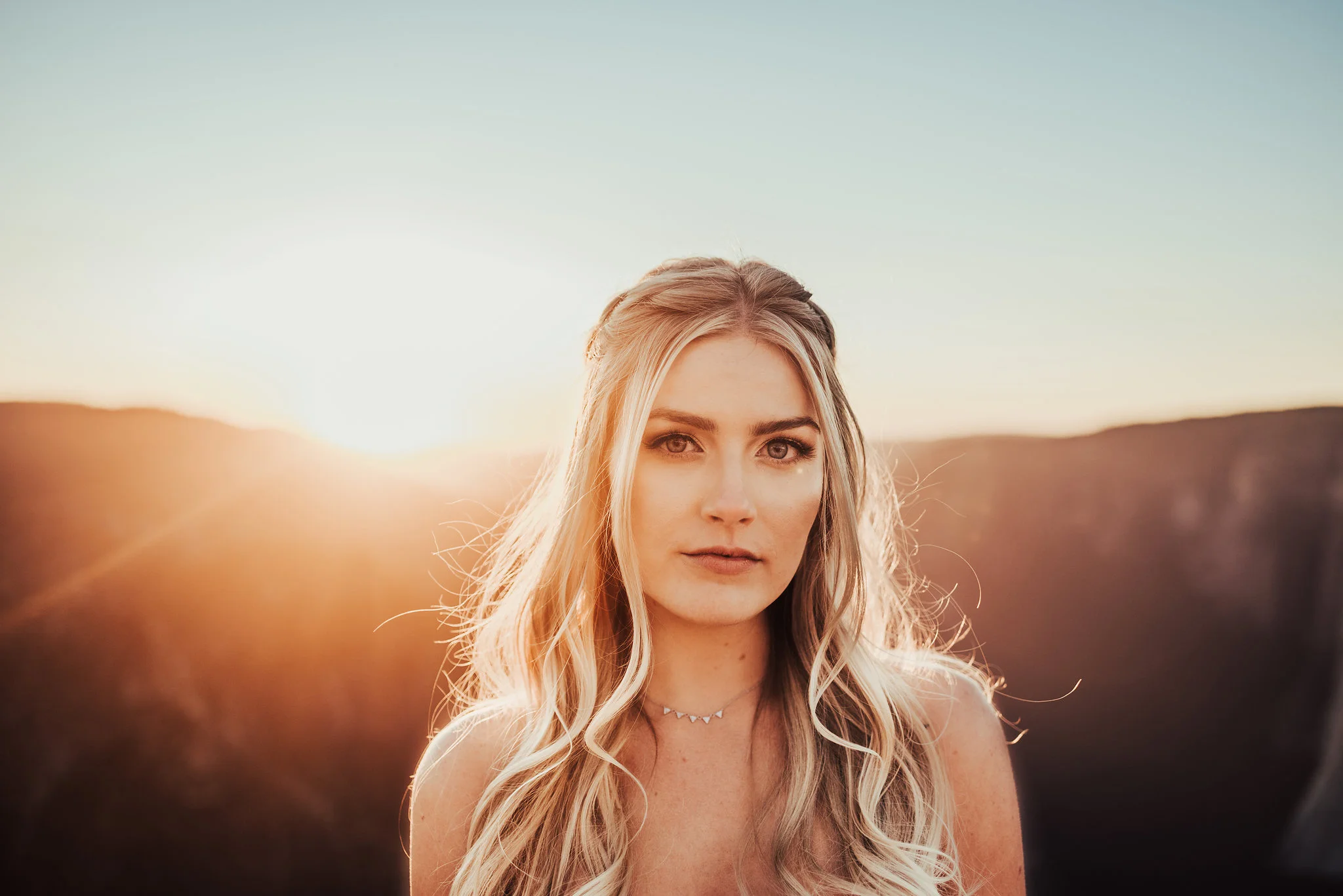 Portrait of a Boho Yosemite Bride at Sunset Photographed by Big Sur Wedding Photographers Tessa Tadlock