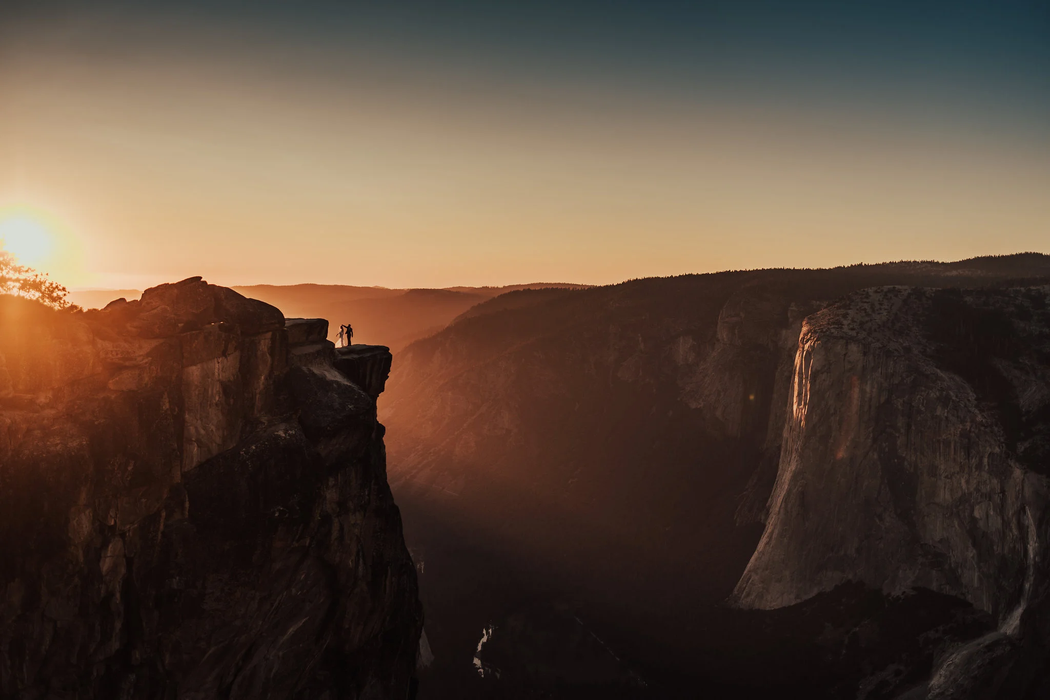 Adventure Yosemite elopement with cliffside bride &amp; groom portrait photographed by Big Sur Wedding Photographers Tessa Tadlock 