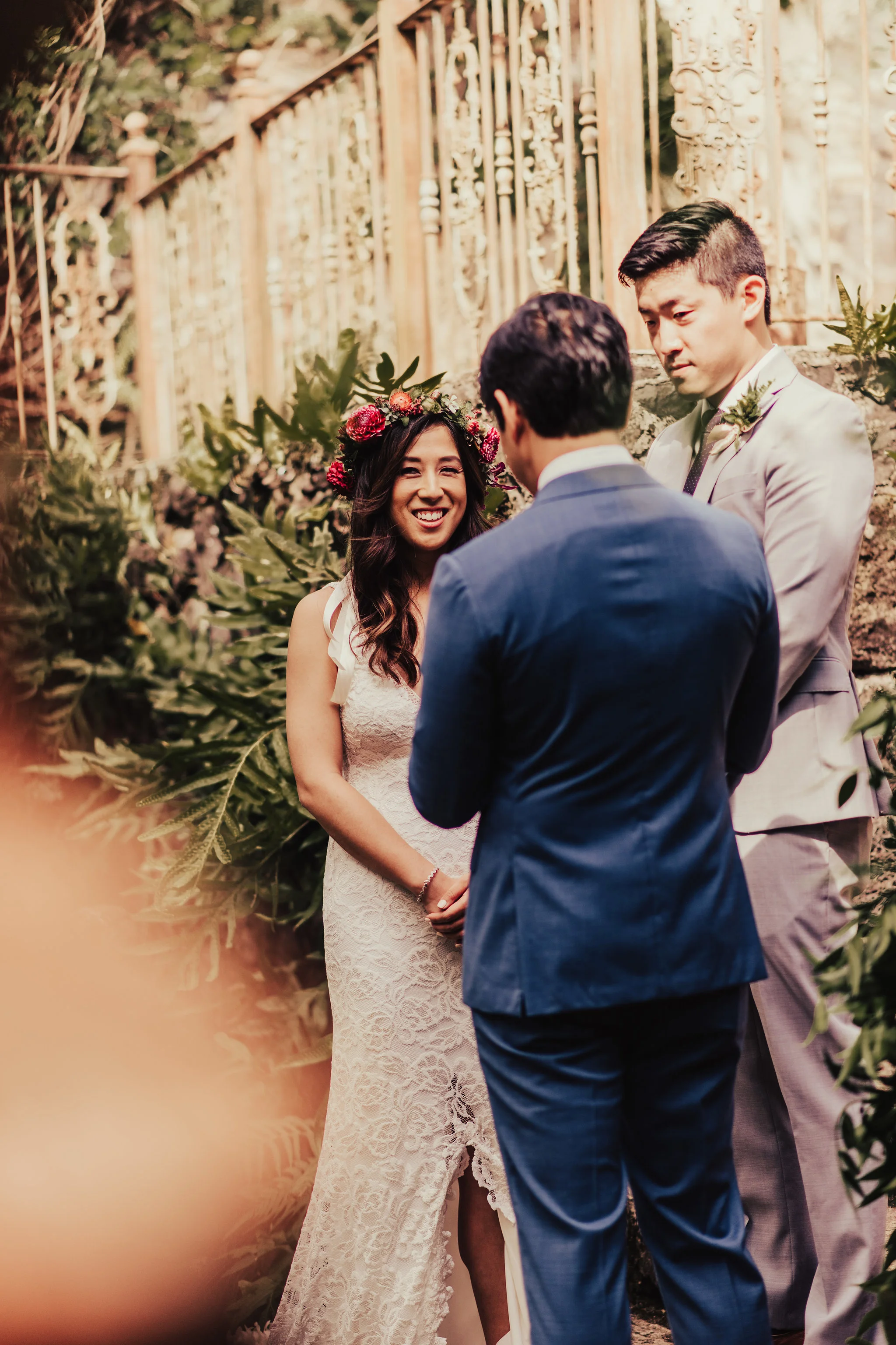 Boho Bride smiling at Groom during Ceremony Photographed by Santa Barbara Wedding Photographers Tessa Tadlock