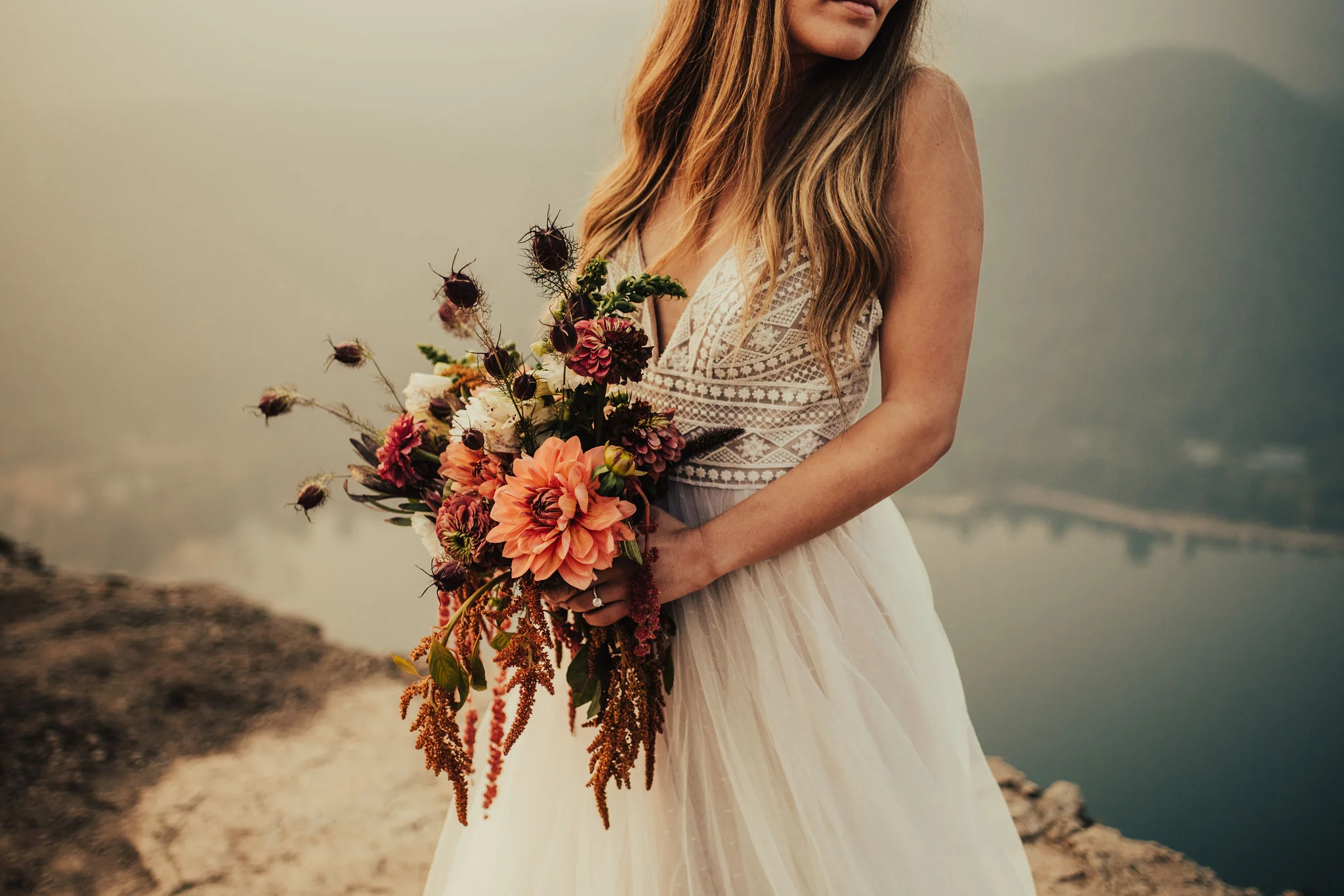 Boho Bride in BHLDN Gown Holding Bouquet Photographed by Santa Barbara Wedding Photographers Tessa Tadlock