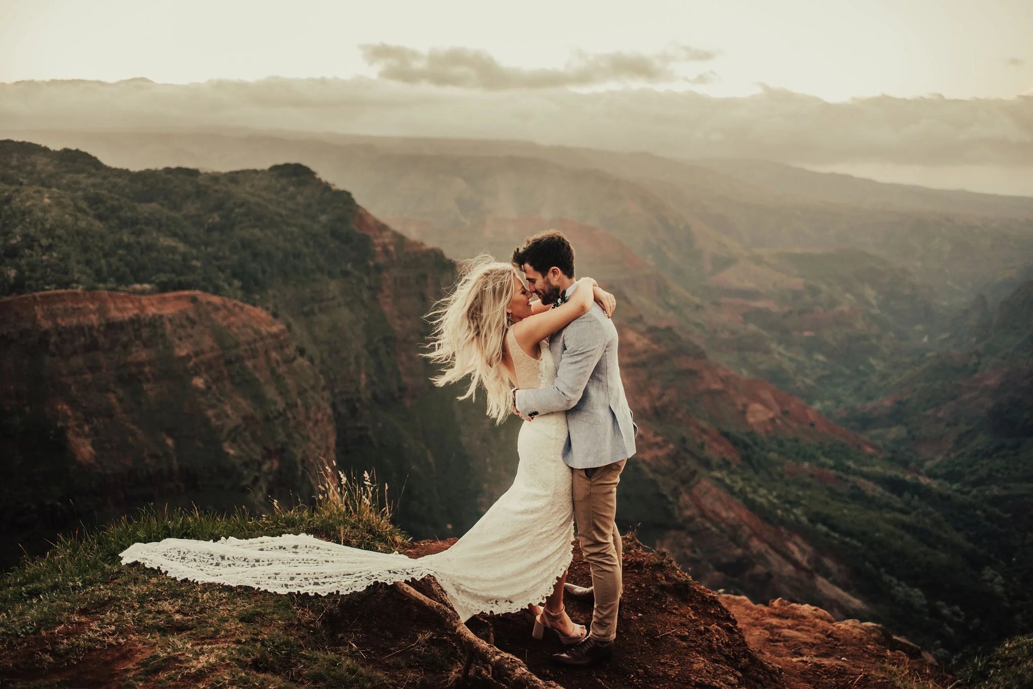 Cliffside bride &amp; groom portraits in Hawaii photographed by Big Sur Wedding Photographers Tessa Tadlock 