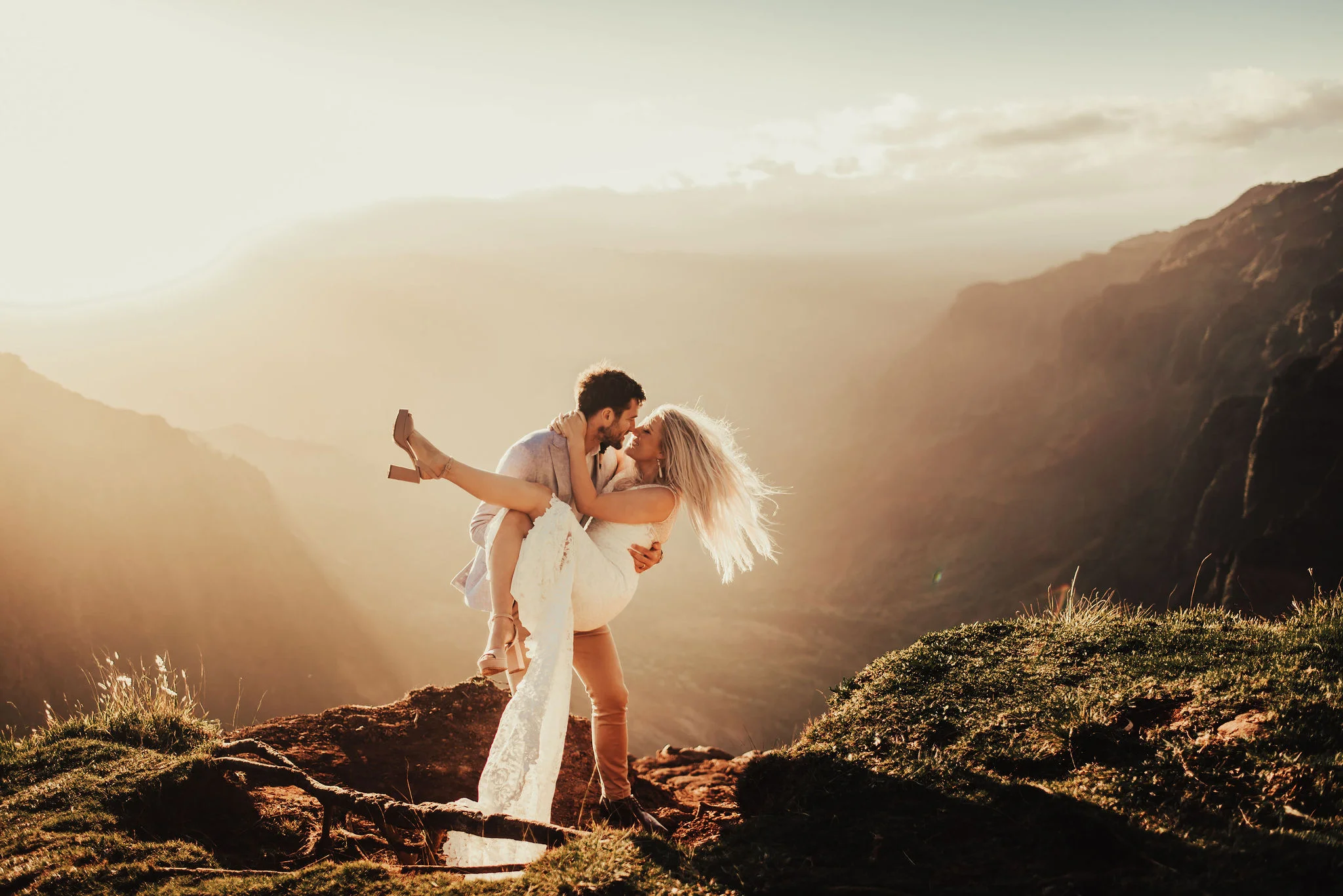 Intimate Elopement on the Cliffs of Kauai Photographed by Big Sur Wedding Photographers Tessa Tadlock 