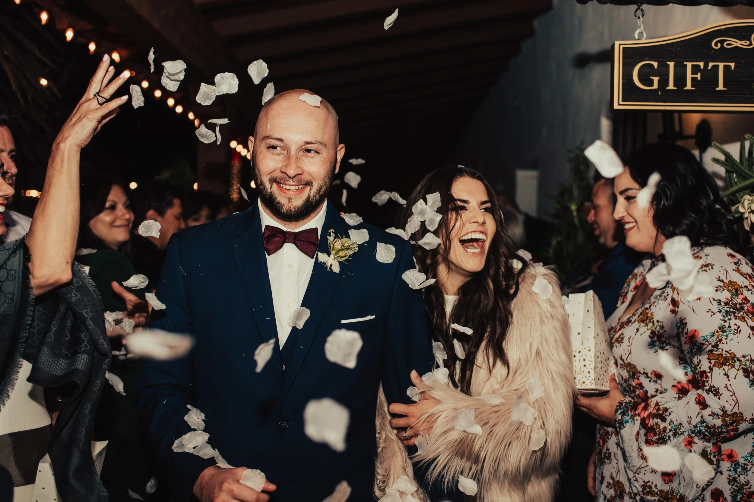 Glam Wedding Exit with Flower Petals Thrown Photographed by Big Sur Wedding Photographers Tessa Tadlock