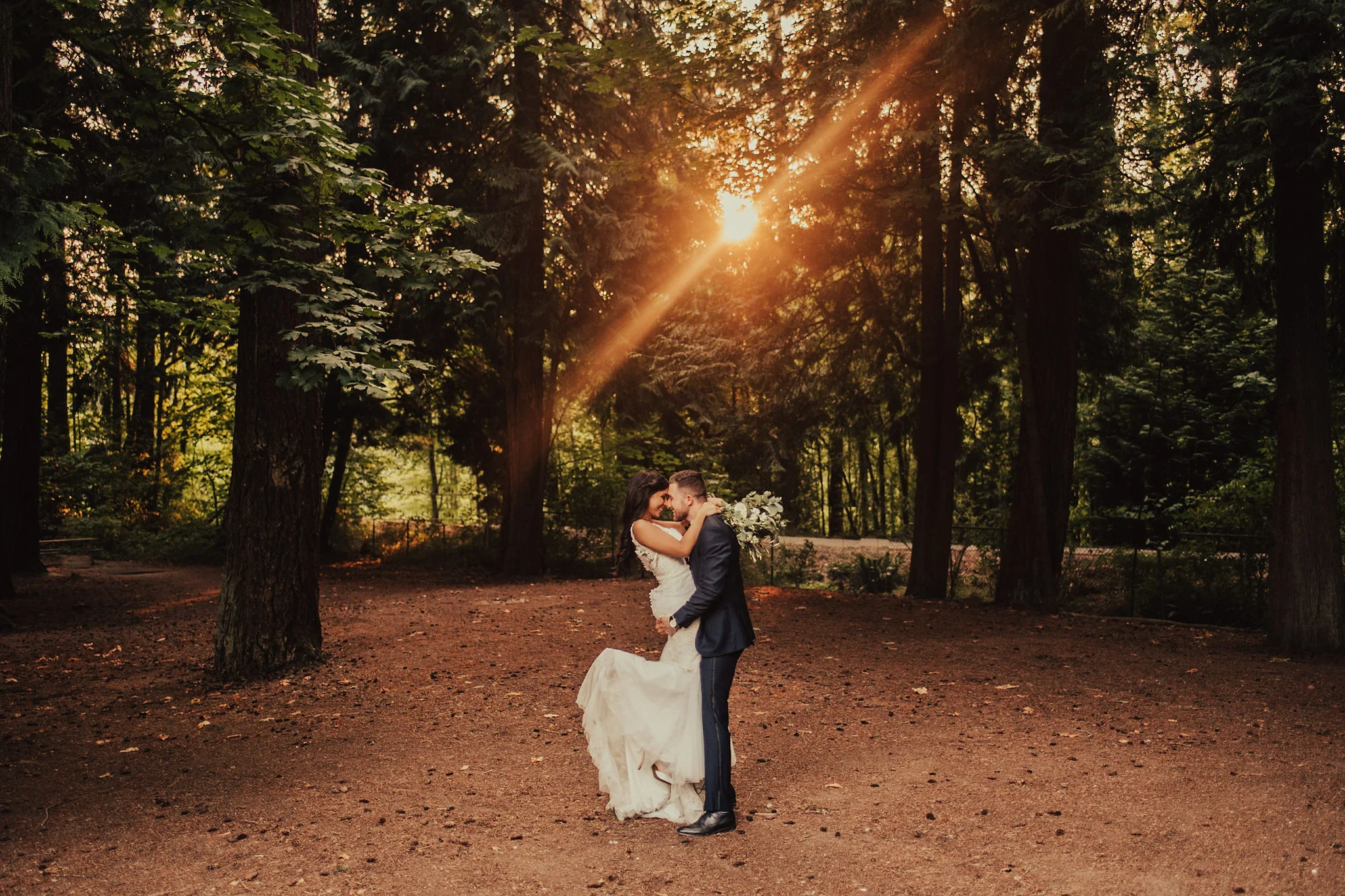 Sunset Forest Portraits with Carefree Couple Photographed by Big Sur Wedding Photographers Tessa Tadlock