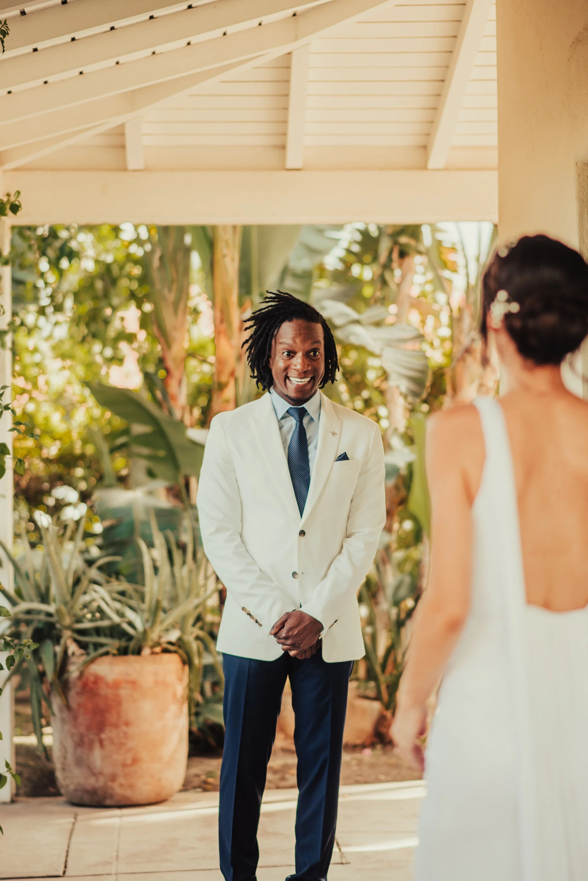 Groom smiles at the bride during sweet First Look photographed by Big Sur Wedding Photographers Tessa Tadlock 